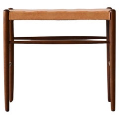 Tabouret vintage avec assise en simili-cuir