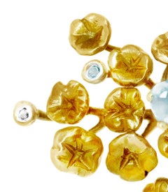 Eighteen Karat Yellow Gold Contemporary Cocktail Ring with Paraiba Tourmalines