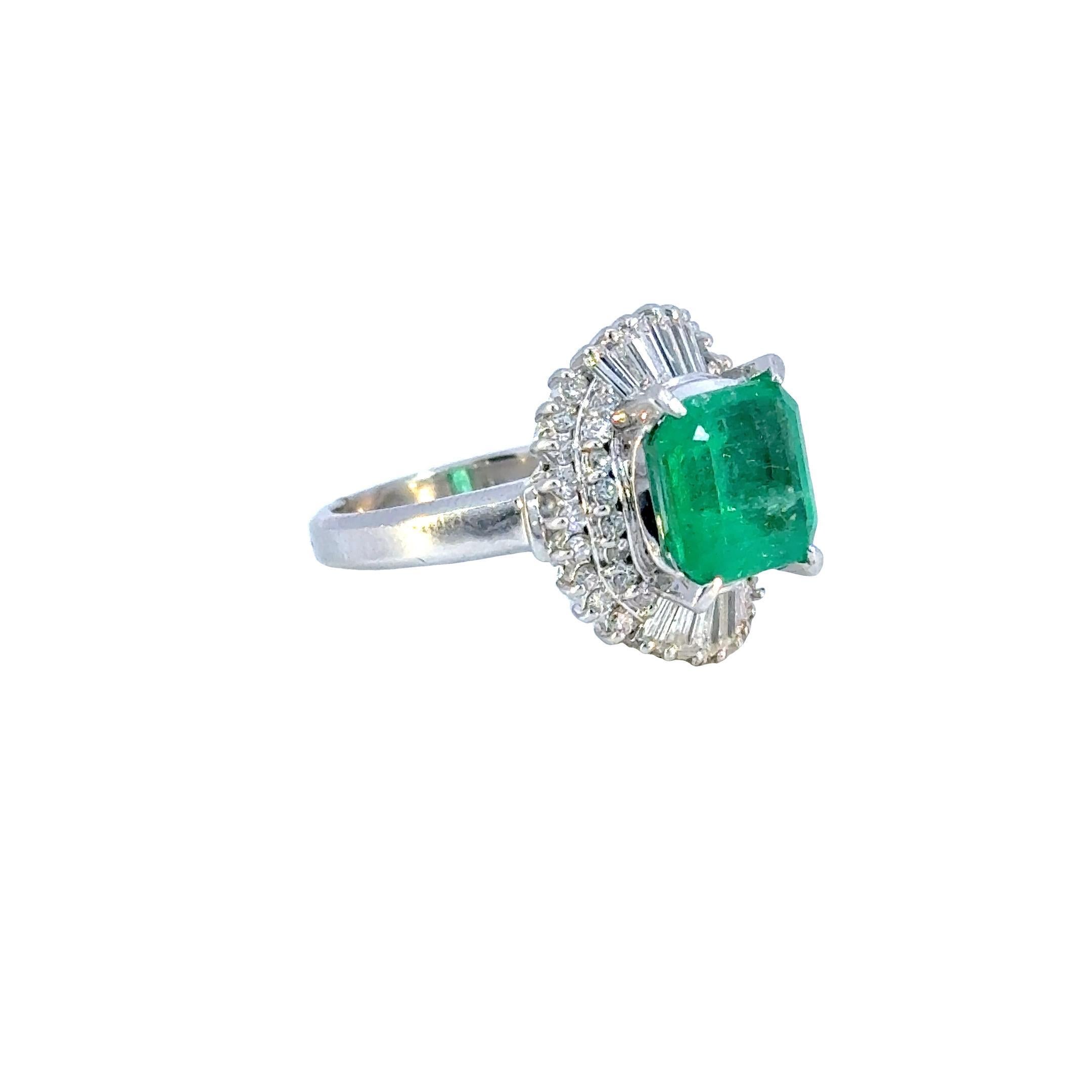 Modern SGL Certified 3.32 Carat Emerald Diamond Platinum Ring For Sale