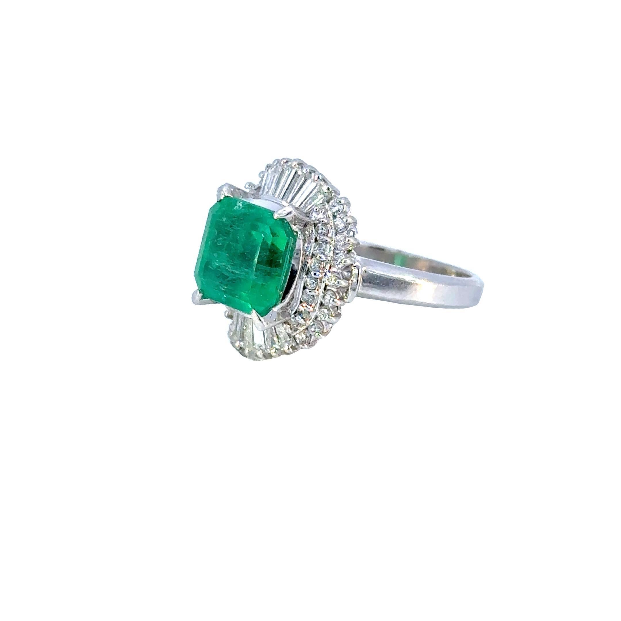 Emerald Cut SGL Certified 3.32 Carat Emerald Diamond Platinum Ring For Sale