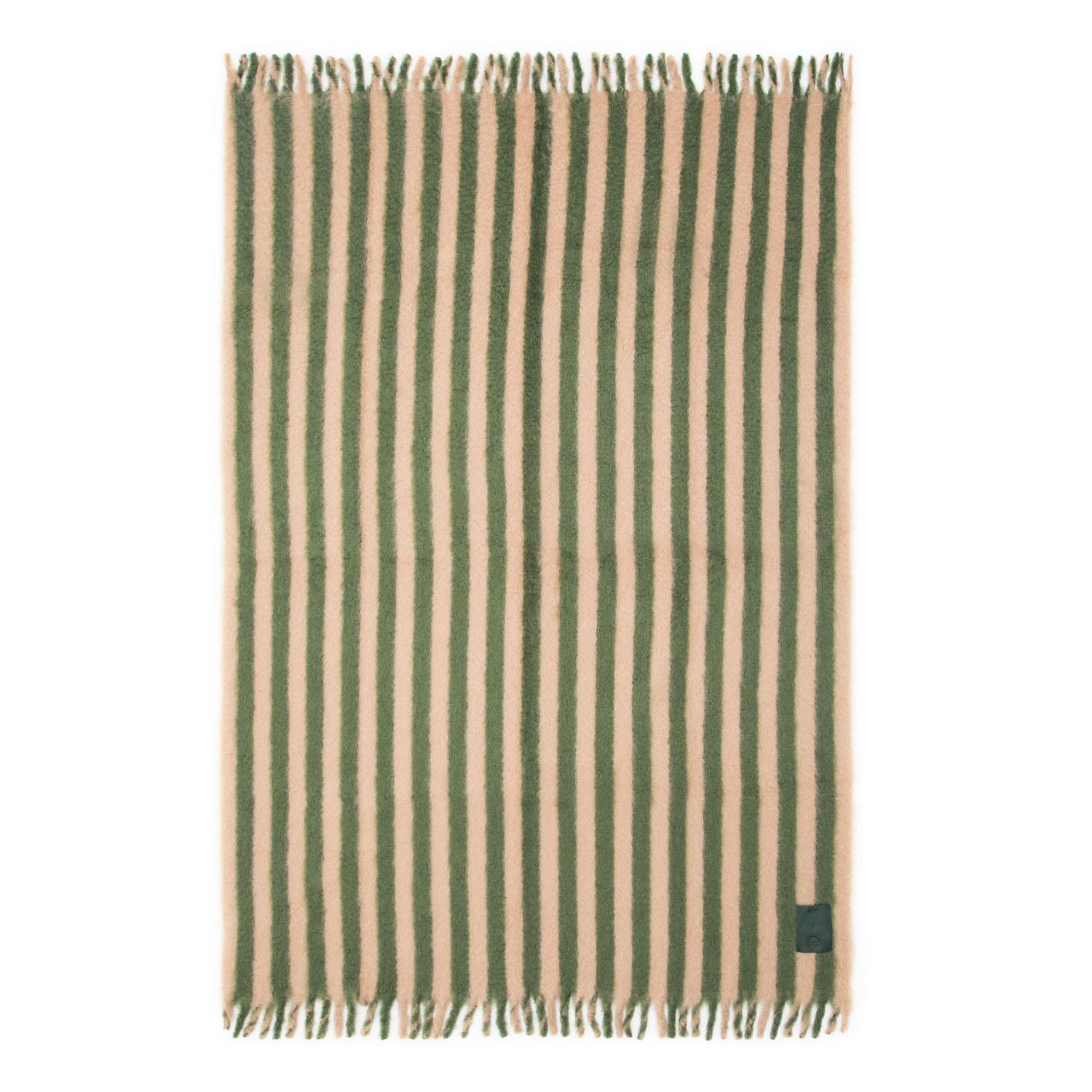 Playful yet refined our second collaboration with award-winning New York-based designer Giancarlo Valle in here. The capsule showcases our high volume hand woven mohair blankets in two unexpected multi stripe combinations finished in a thick fringe