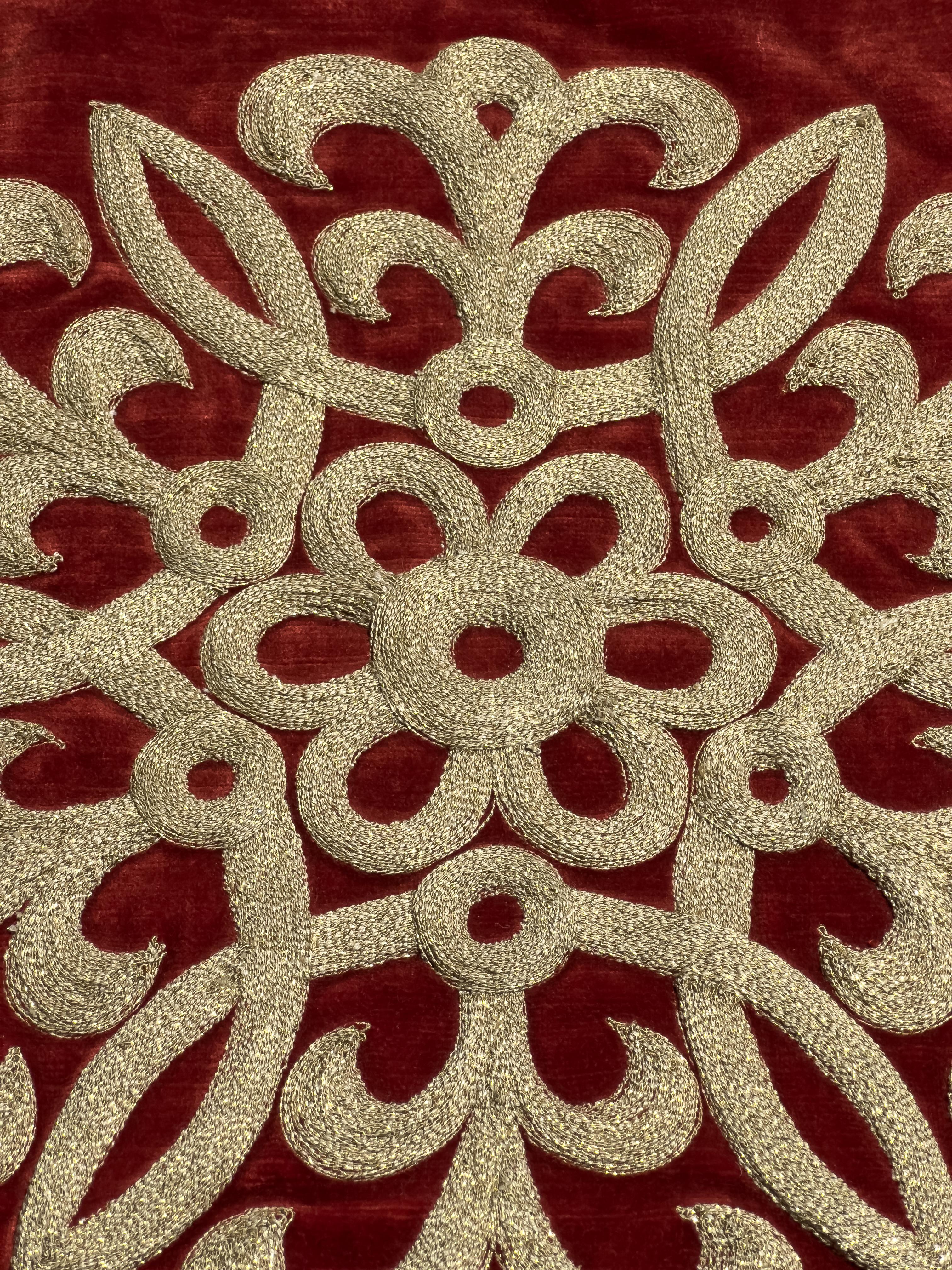 an embroidered wall hanging made found in kairi's houses