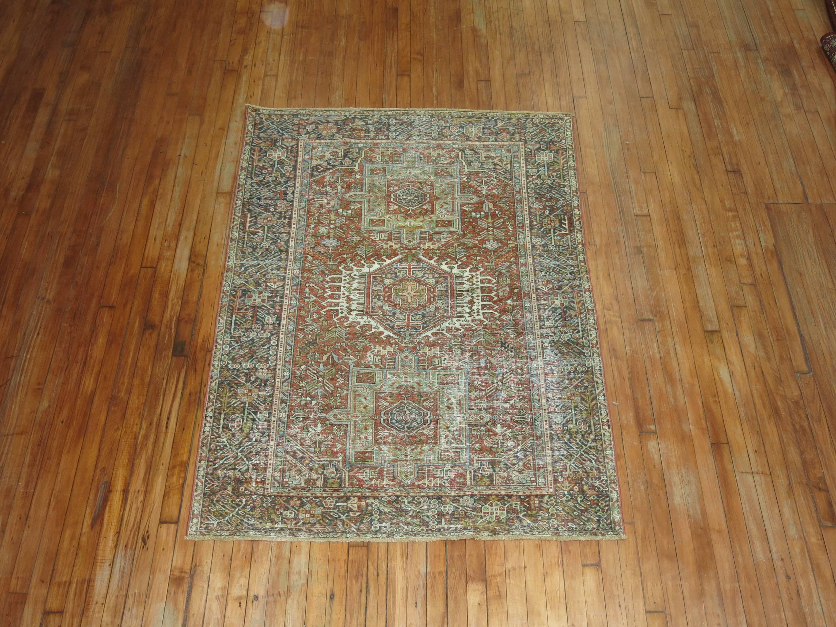 Intermediate size shabby chic Persian Heriz rug, accents in soft red, green, brown.

4'5'' x 6'