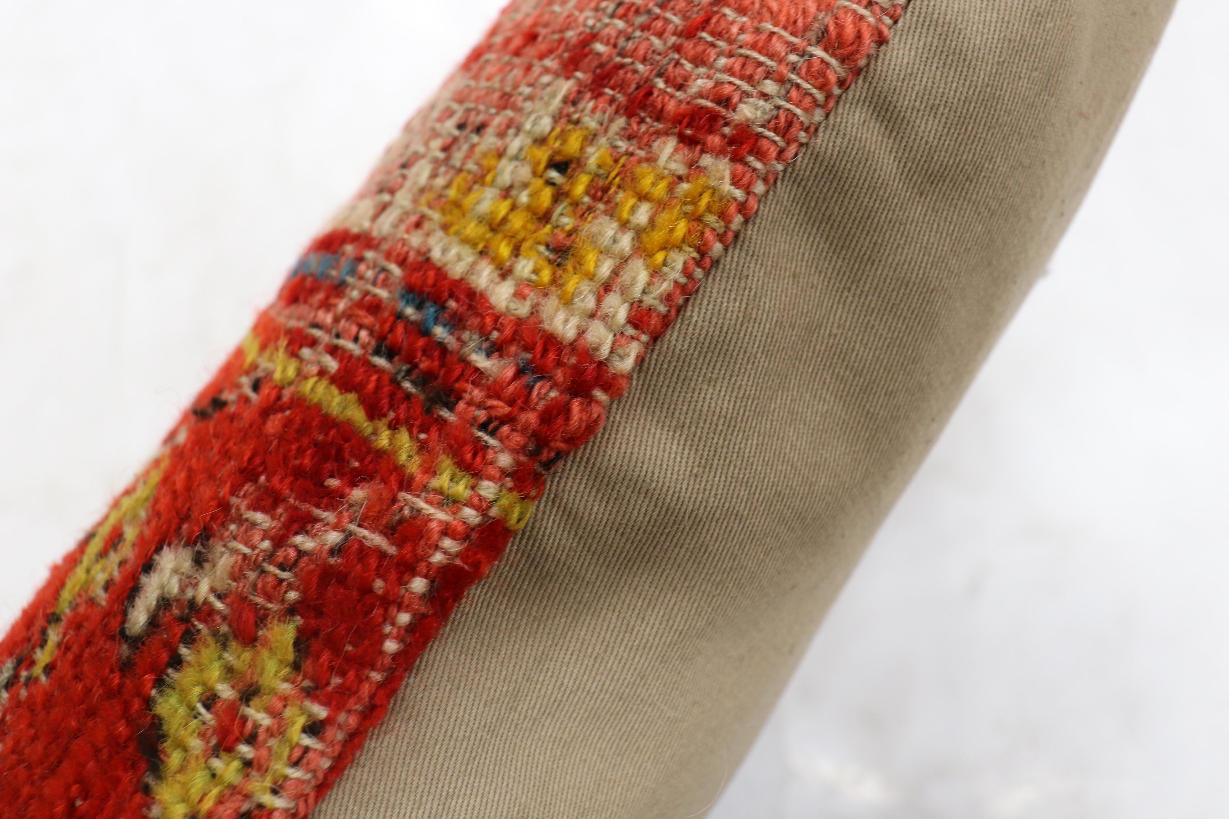 Pillow made from an antique Turkish Ghiordes rug from the early 20th century.

Measures: 16