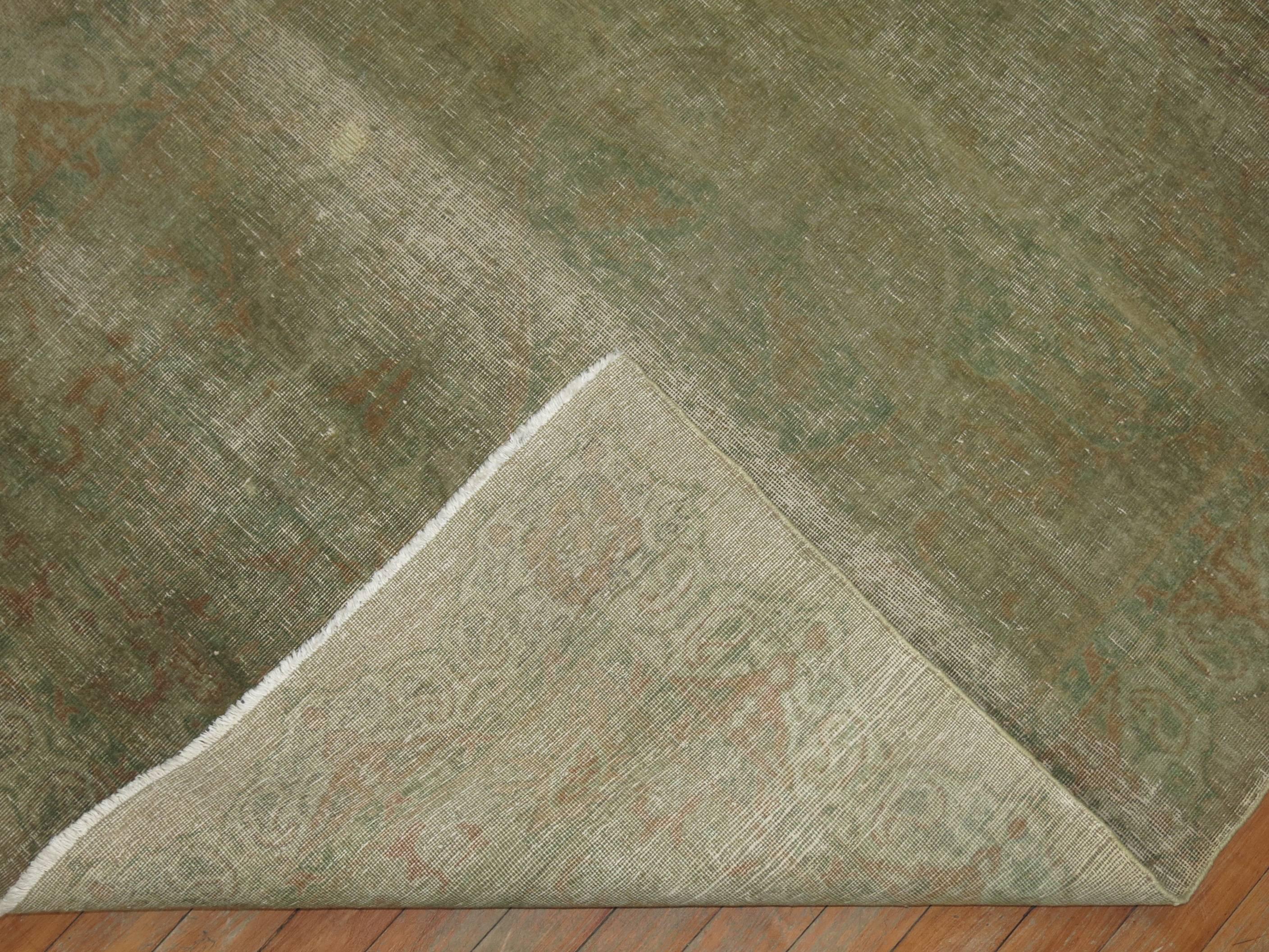 An early 20th-century Turkish distressed carpet.

4' x 6'1''
