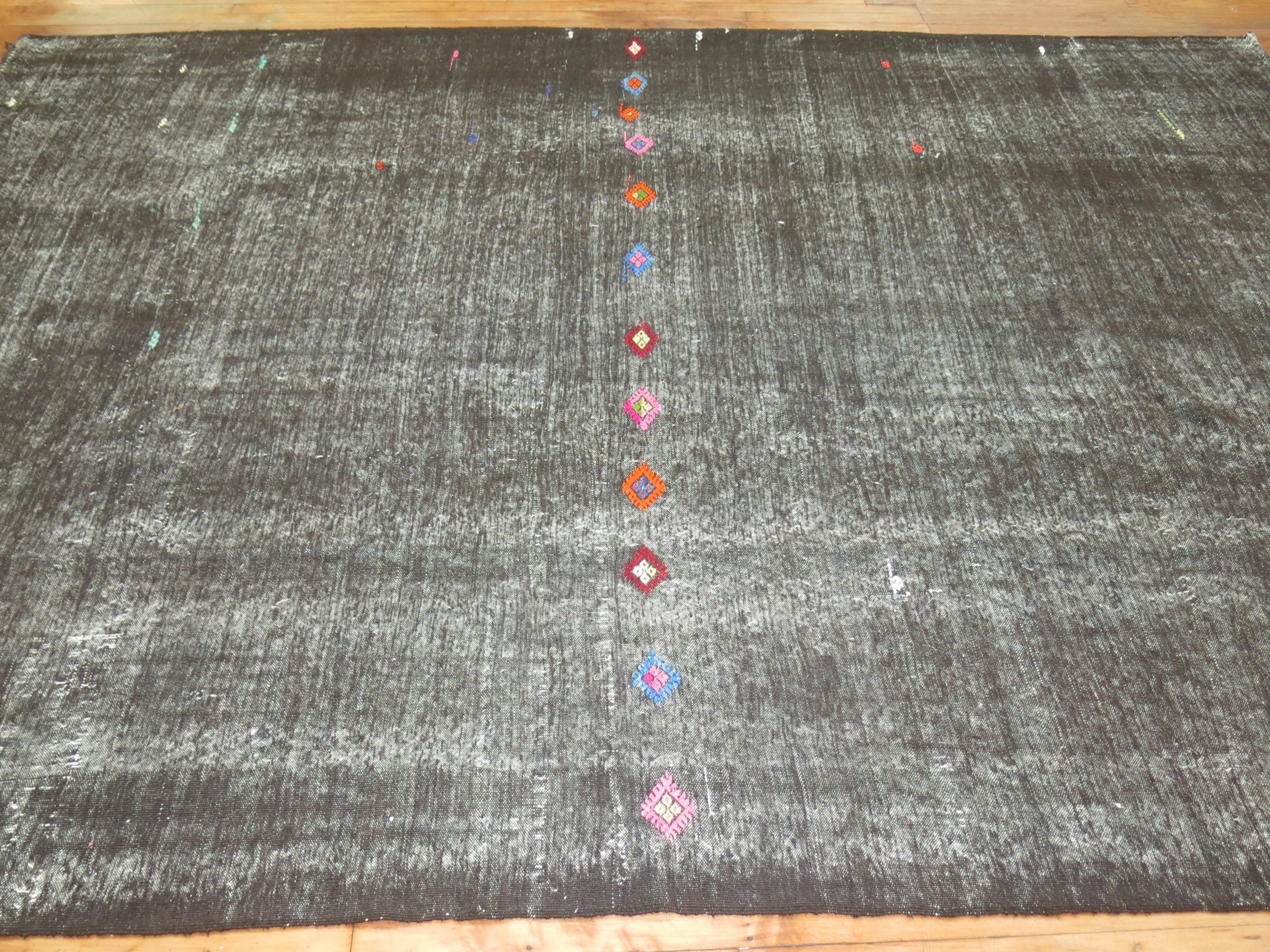 A quirky one of a kind room size shabby chic Turkish Kilim flat-weave.

7'10'' x 11'2
