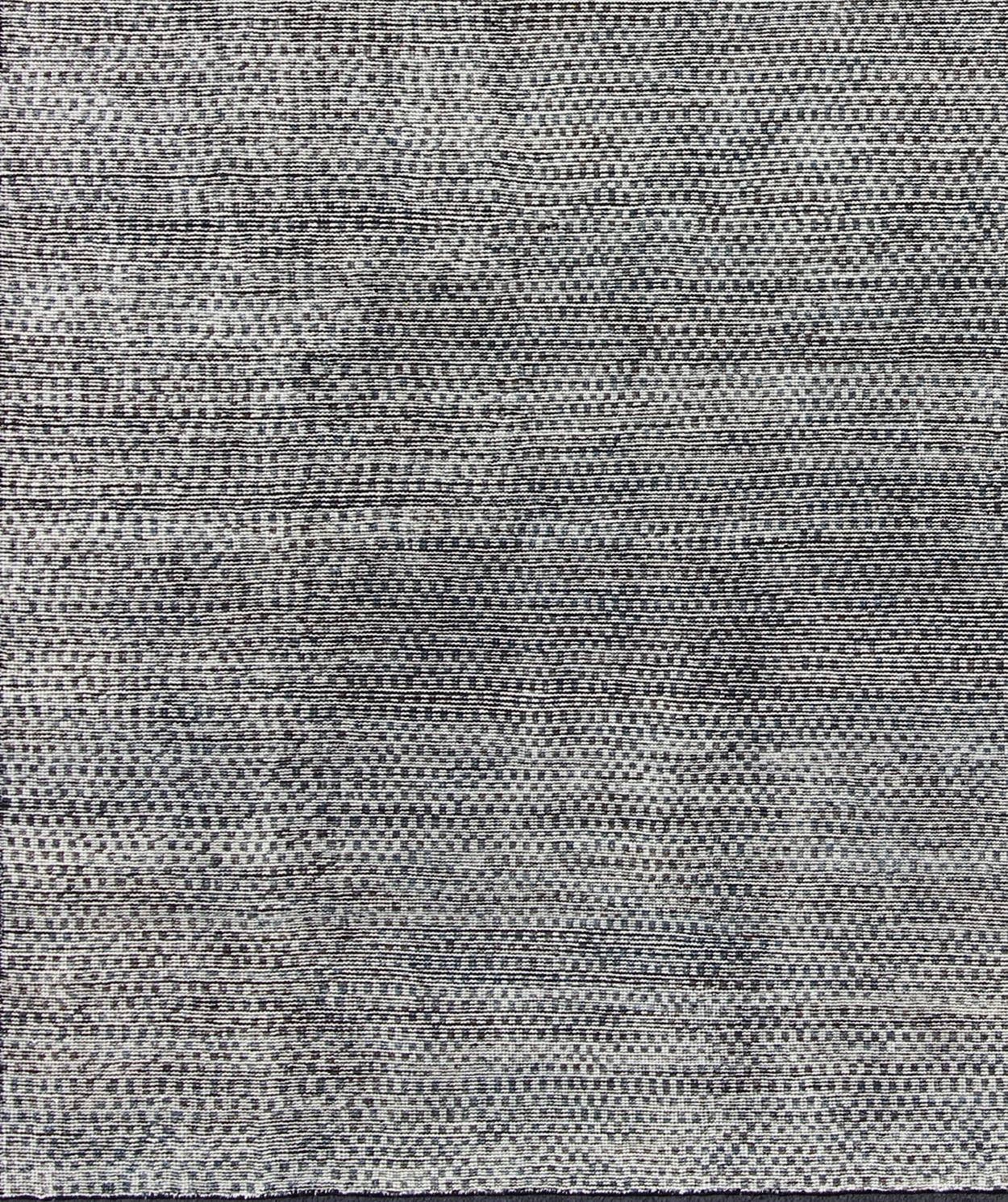 Shades of gray, white and charcoal in this modern design distressed rug.  rug/khn-506-tr-577, country of origin  / Scandinavian Modern Piled distressed Rug.

This rug gets inspirations from abstract and modern designs with a distressed pile. With a