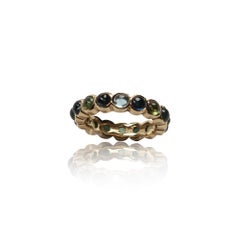 Green and Blue Tourmaline Eternity Band Ring in 14 Karat Yellow Gold
