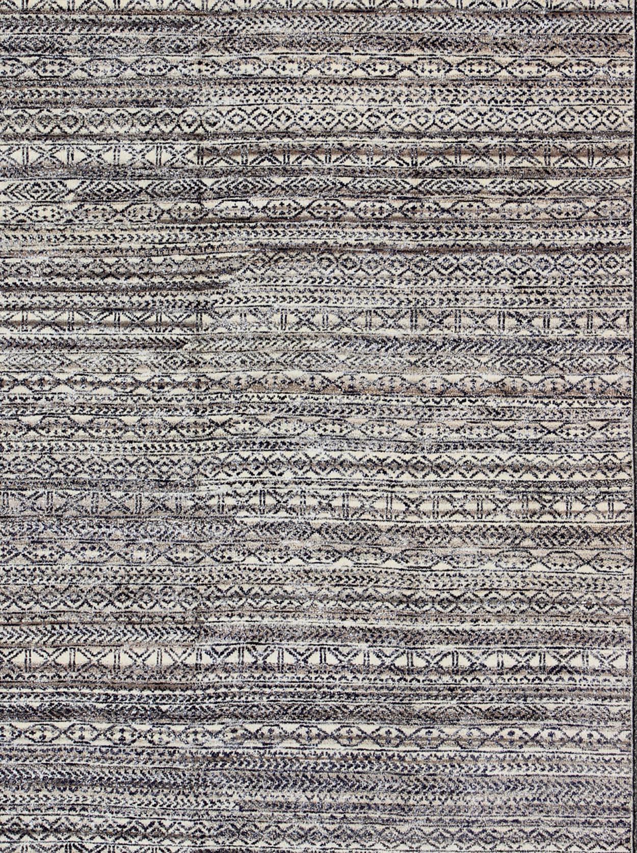 Shades of royal blue and charcoal modern Indian piled rug, rug KHN-417-TR-D2-60, country of origin / type: India / Scandinavian piled rug.

This modern rug is inspired by the work of textile designers of the early to mid-20th century. With a