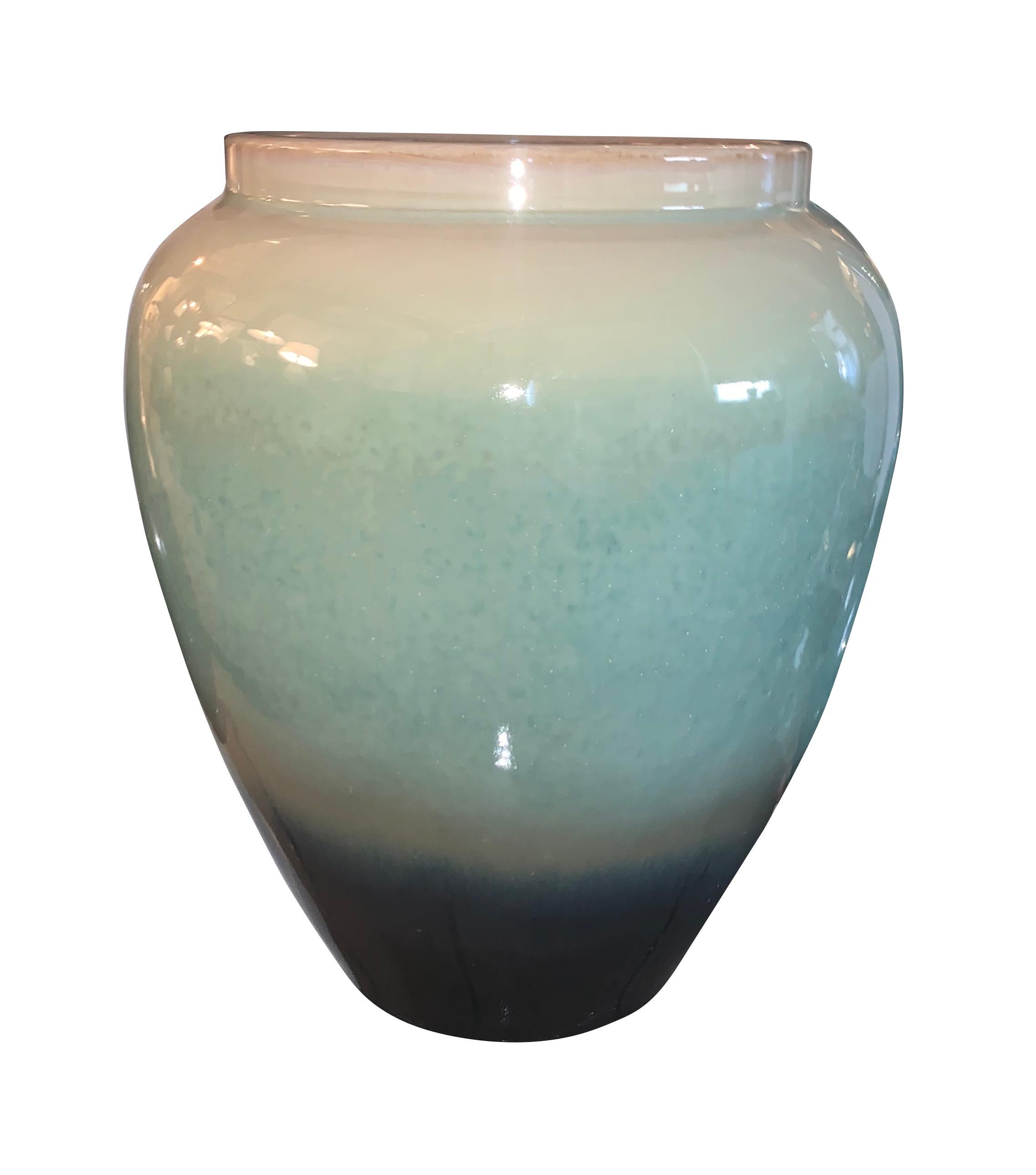 Contemporary Chinese ceramic vase with graded shades of turquoise color way.
