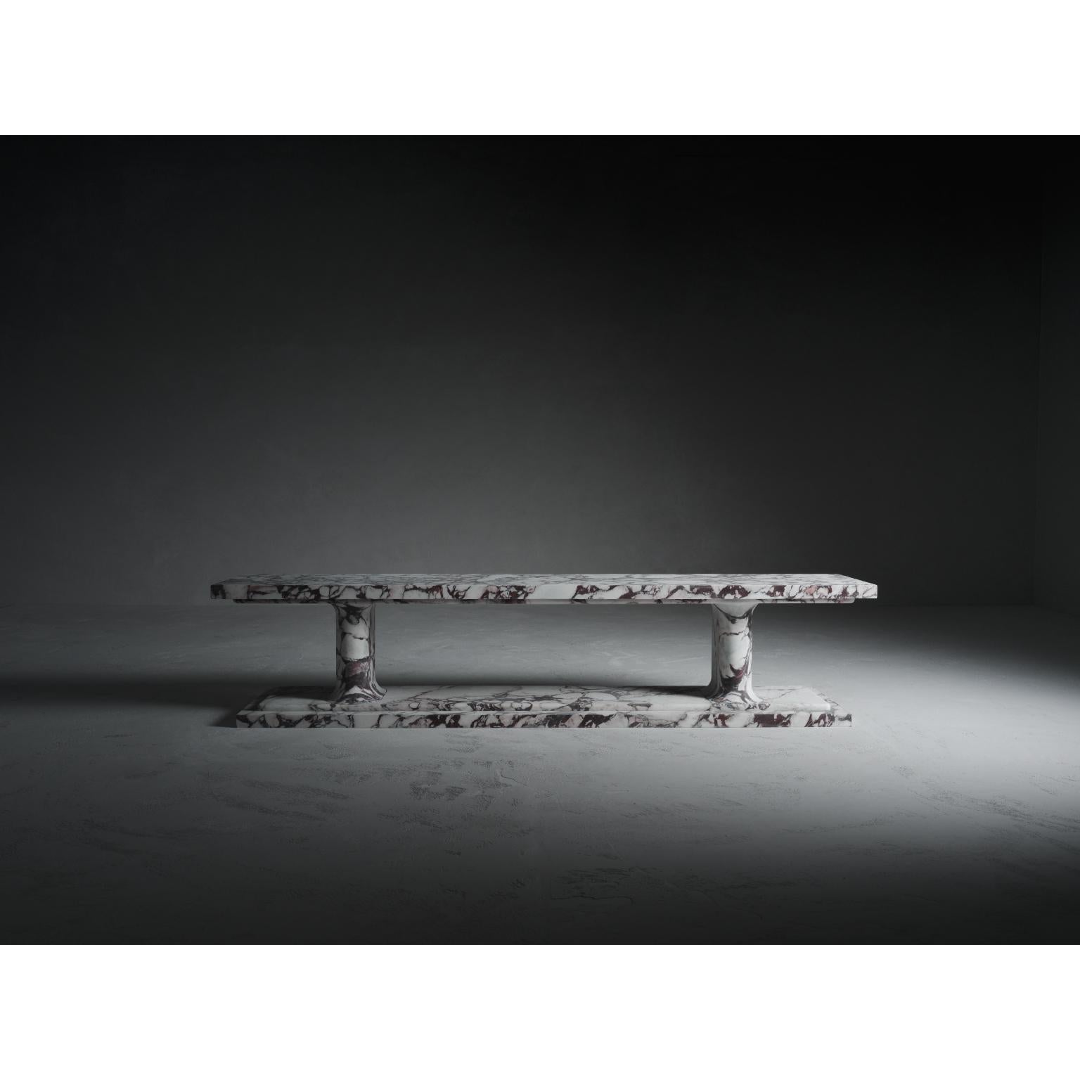 Shadow Bench by Kreoo 
Designed by Christophe Pillet
Dimensions: D 42 x W 200 x H 43 cm.
Materials: Calacatta Viola marble.

Available in different marble and travertine options. Please contact us.

The contrast between sharp, linear profiles and