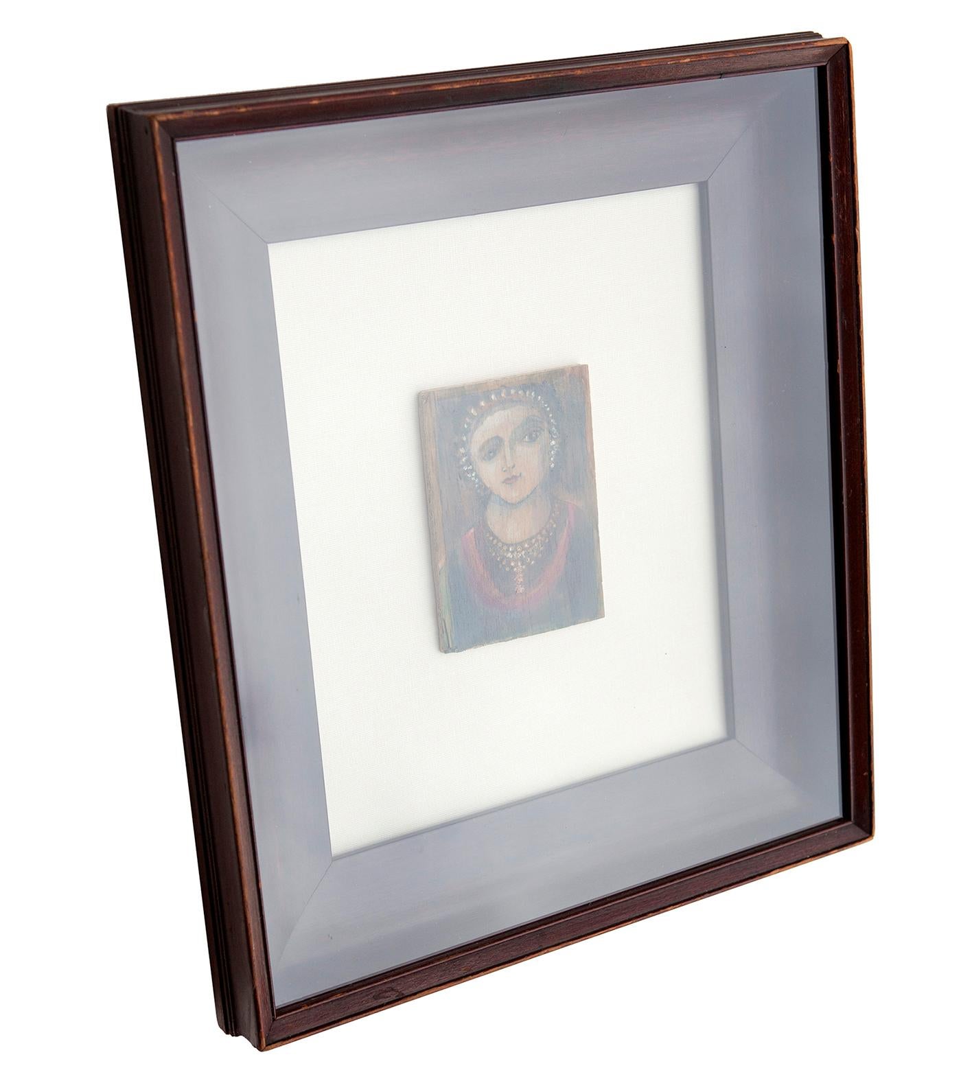 Original oil painting mounted on linen & place in antique Empire period shadowbox mahogany frame. Unknown naive painting with a charming rendition of a female bust. The painting is dated, 2005.
