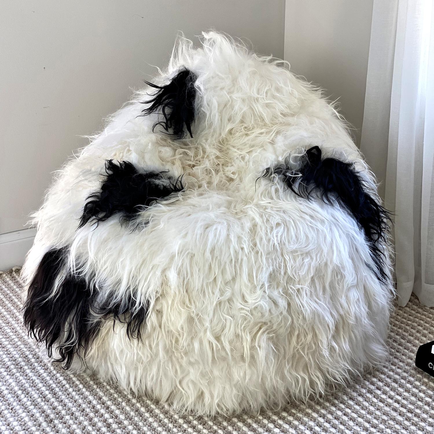 Imagine relaxing into this cozy genuine sheepskin beanbag while you unwind after a long and tiring day. This inviting shaggy bean bag chair is handcrafted from the finest long wool Icelandic sheepskin resulting in the most amazing shaggy and tactile