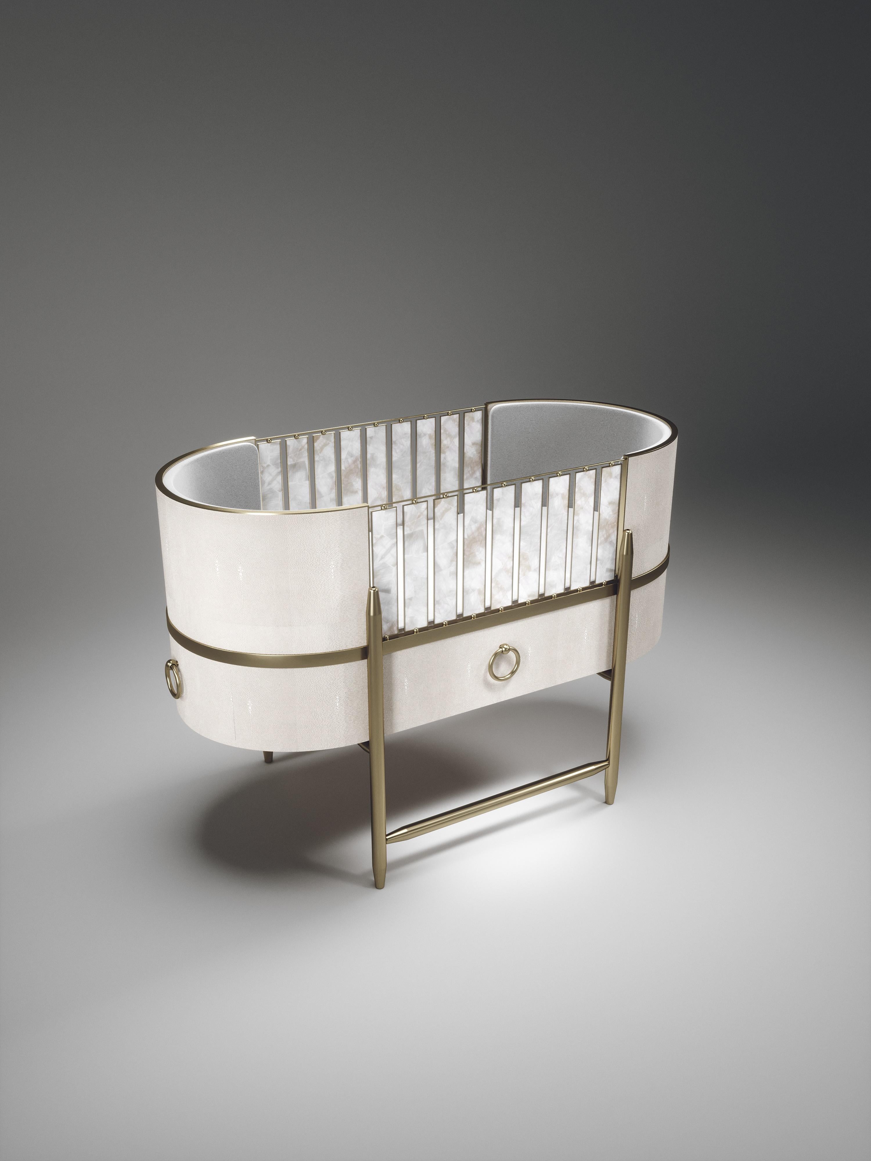 The Chabanais Baby Crib by Kifu Paris is the ultimate luxury piece for your child's bedroom. Inspired by the birth of her first child, Kifu Augousti designed this piece to embrace the whimsical world of a child. The piece is inlaid in cream shagreen