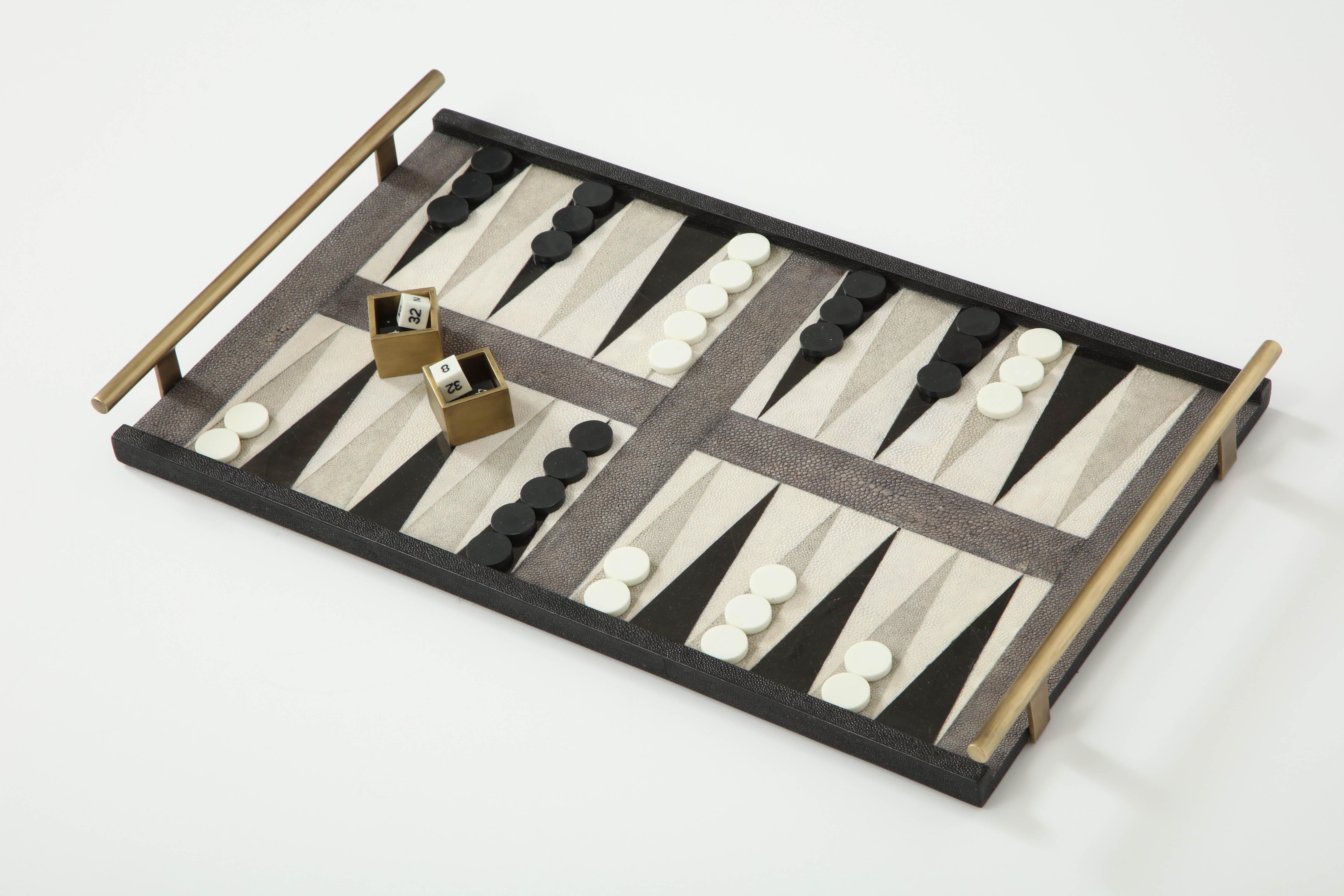 Decorative shagreen and black sea shell backgammon game with bronze details.