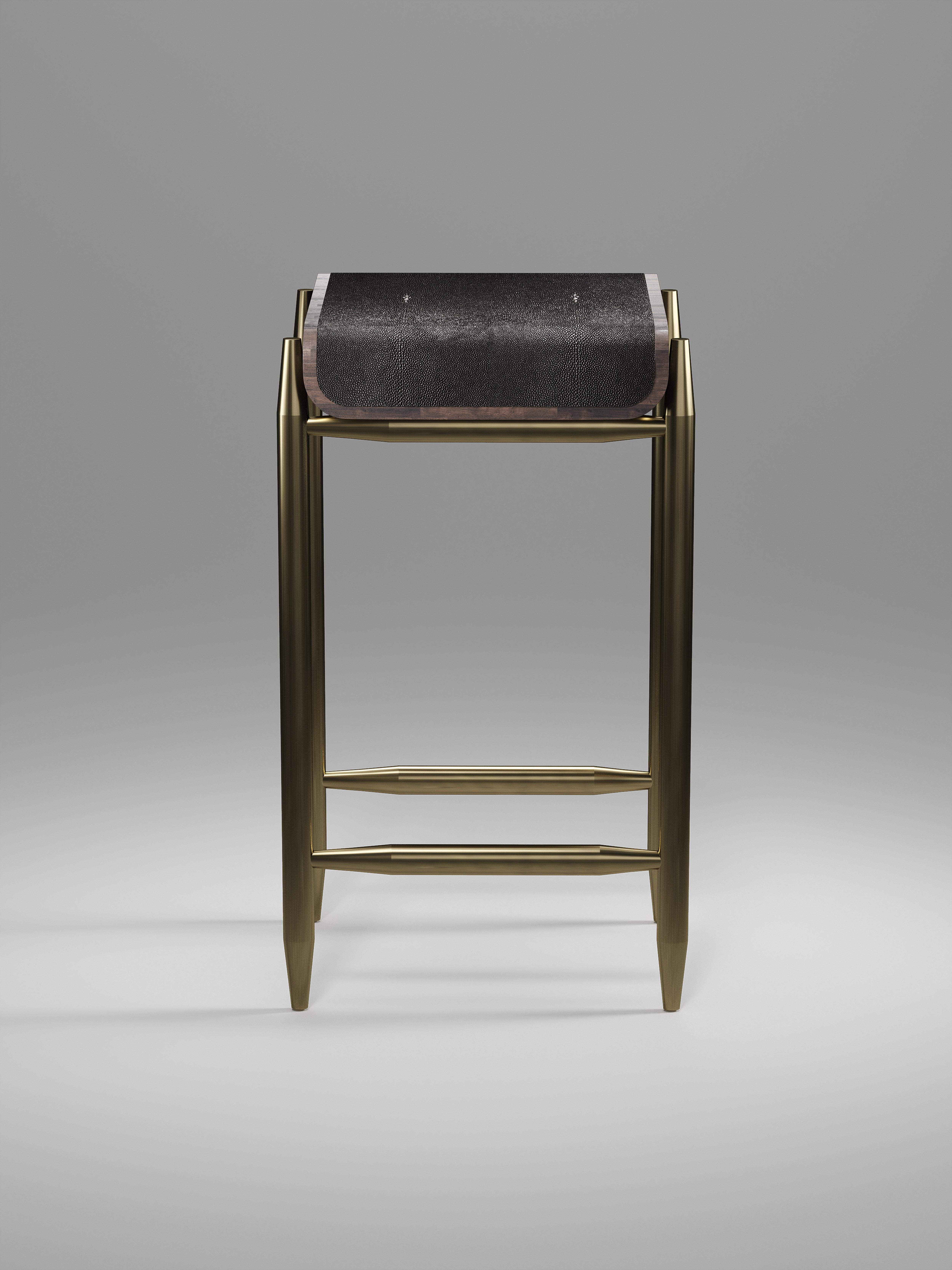 Inspired by the original Dandy Bench by KIFU PARIS (see images at end of slide), the Dandy II Bar Stool is the ultimate luxury seating. The seating area is inlaid in coal black shagreen, the frame and sides of the bar stool are in Palmwood and the