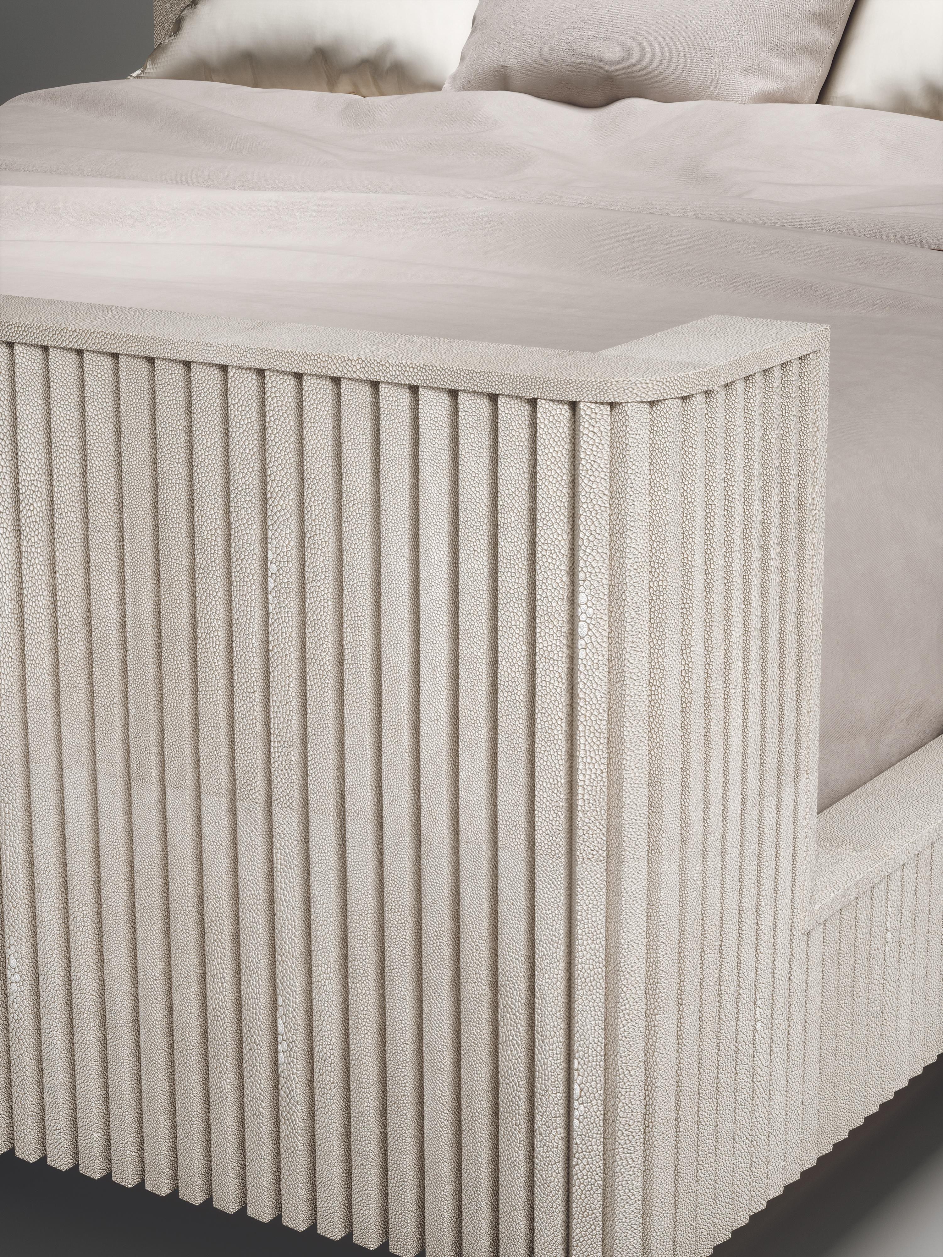The Fluted Bed in Cream Shagreen by R&Y Augousti is a one of a kind piece. This modern and elegant design creates a subtle art deco statement for any bedroom. The inlay and artisanal hand-work of shagreen on this piece shows the incredible work