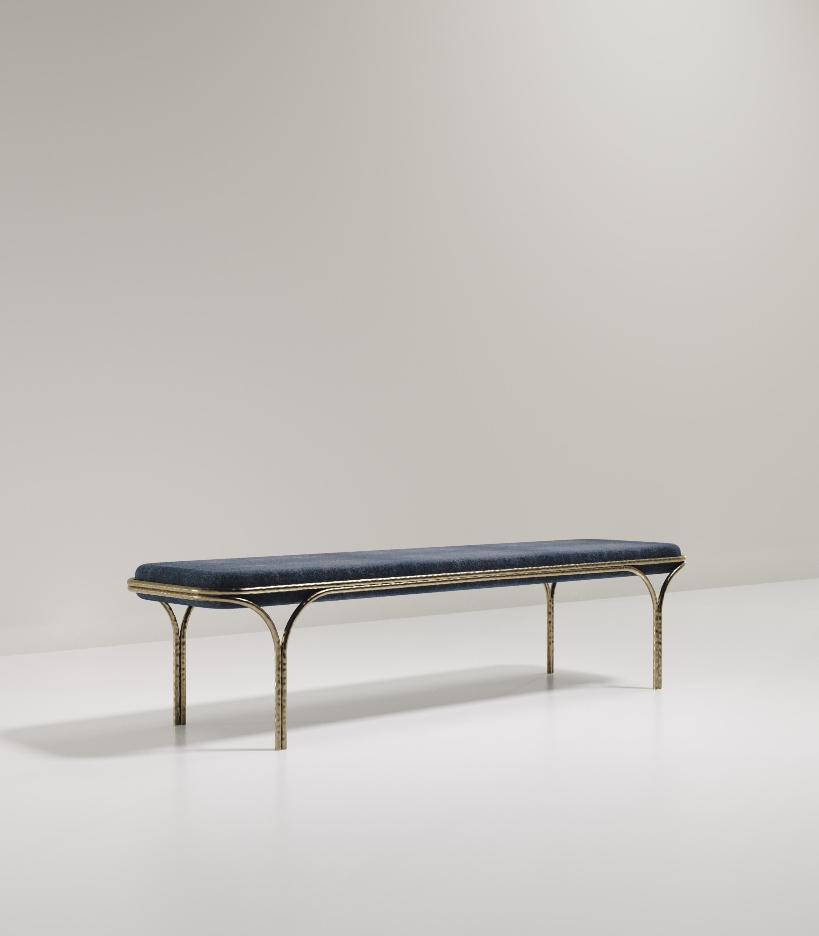 The Arianne Bench by R&Y Augousti is an elegant piece for any space. The denim blue shagreen seat, with curved edges, sits on an organic bronze-patina frame. The intricate frame and legs have a 