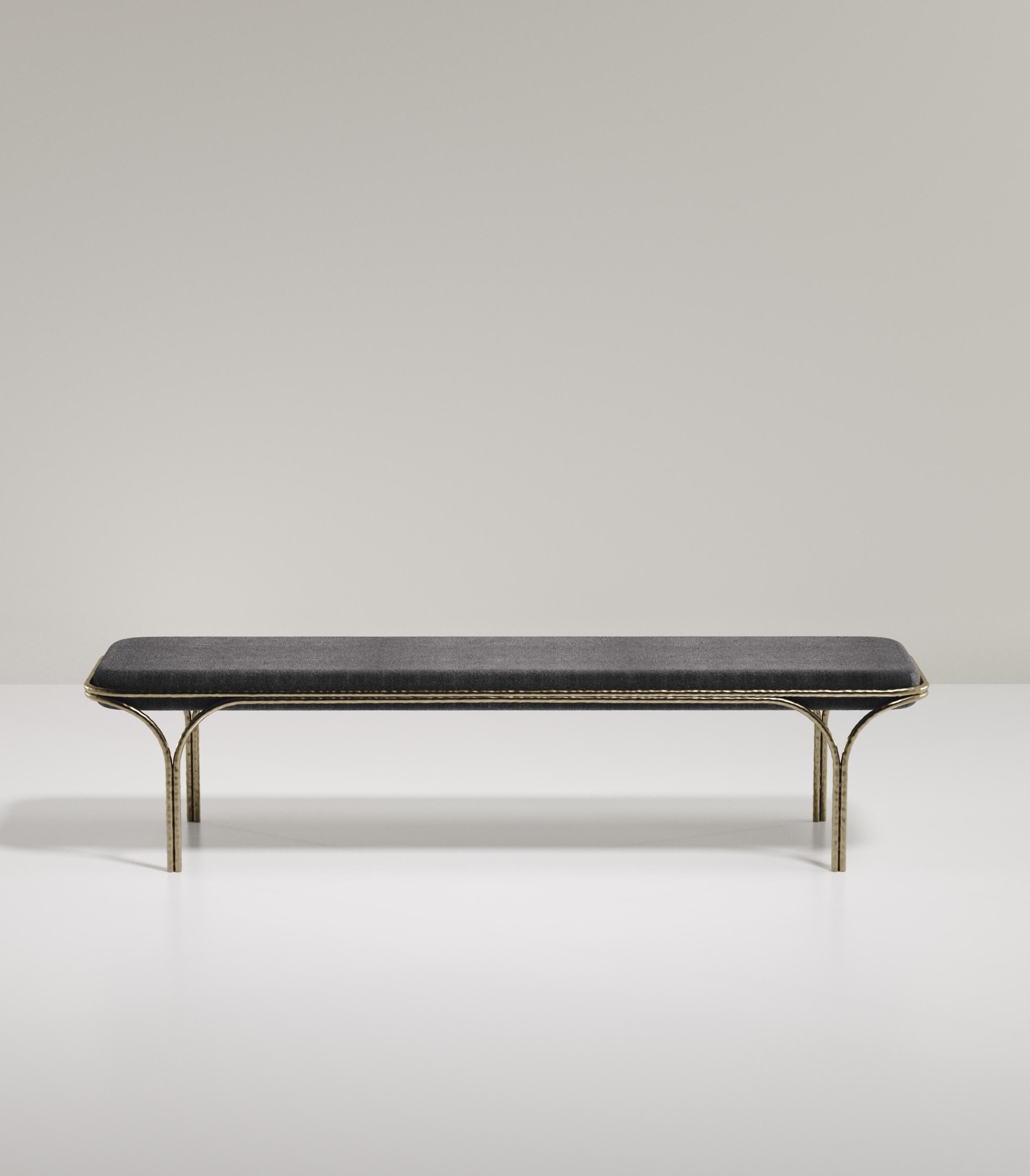 The Arianne Bench by R&Y Augousti is an elegant piece for any space. The coal black shagreen seat, with curved edges, sits on an organic bronze-patina frame. The intricate frame and legs have a 