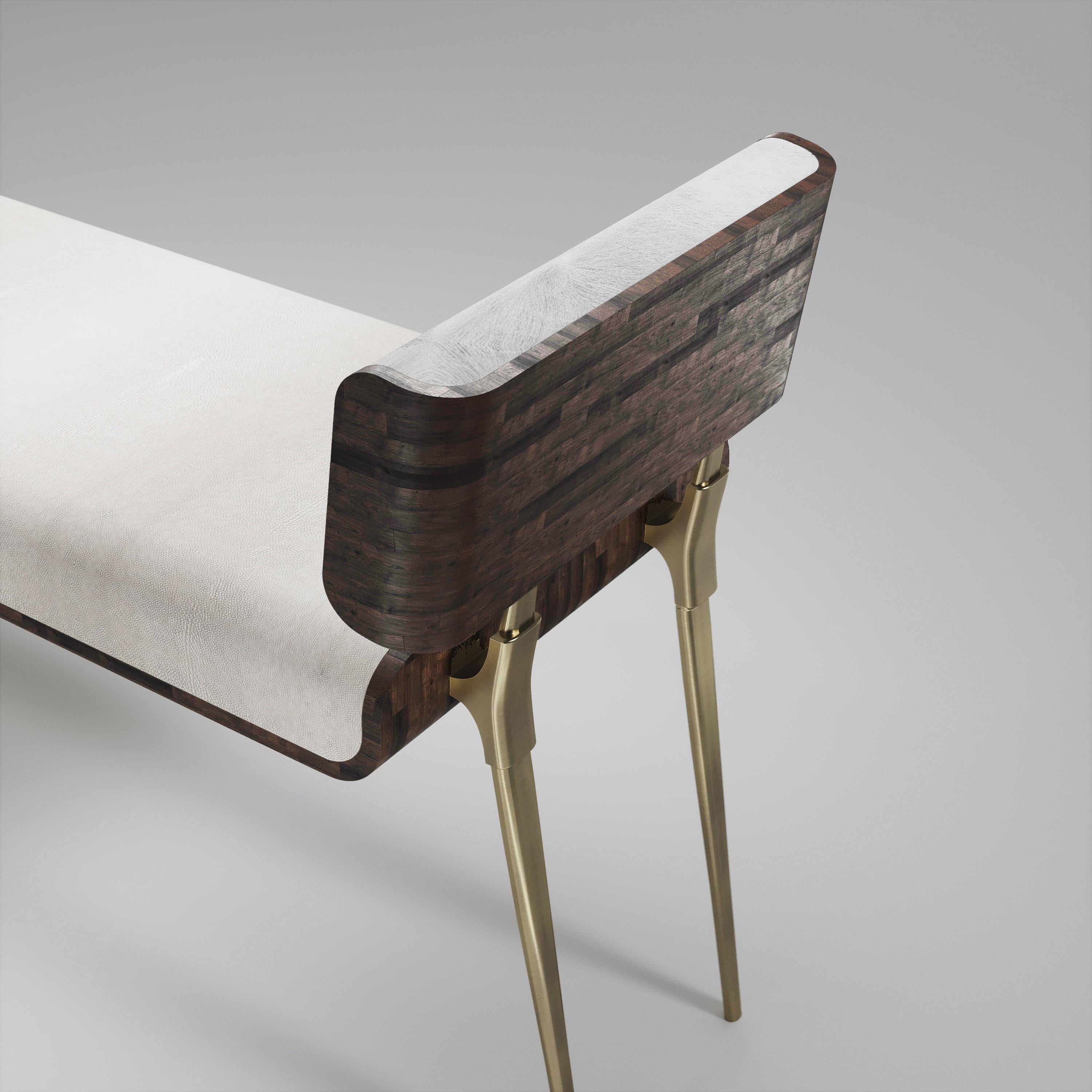Inspired by the original Dandy Bench by Kifu Paris (see images at end of slide), the Dandy II Entrance Bench is the ultimate luxury seating. The seating area is inlaid in cream shagreen the frame and sides of the bench in Palmwood and the legs are