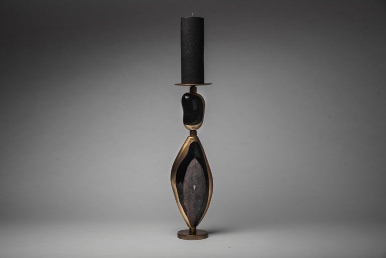 The Cosmo candle base is a whimsical and sculptural piece, inlaid in either option 1 coal black shagreen, black pen shell and bronze-patina brass, or option 2 cream shagreen, mother of pearl and bronze-patina brass. This listing is for option 1. The