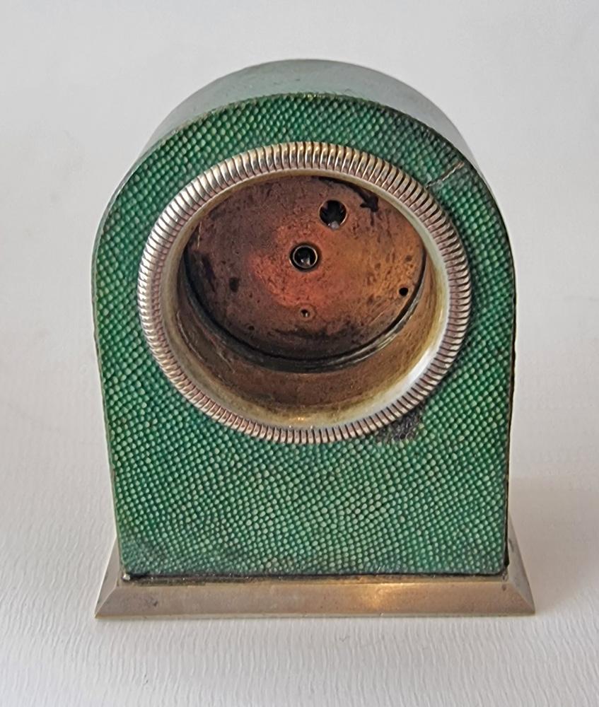 A very unusual and rare shagreen sub miniature carriage or boudoir clock. It dial with arabic numerals and subsidiary seconds dial. Fine 30 hour movement with seconds hands and dial. 