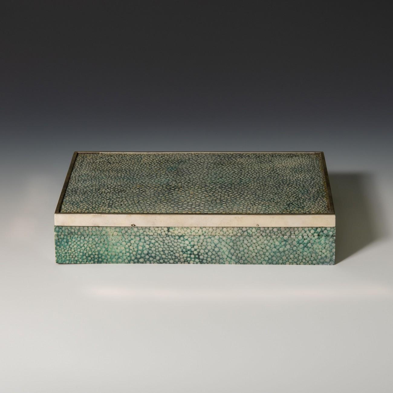 Unusual flat proportioned cigar box with original cedar lined interior and silver edging hallmarked London, 1930. Made by George Betjemann and Sons, 36 Pentonville Road, London. N1. The business was started by the poet Sir John Betjemann’s great
