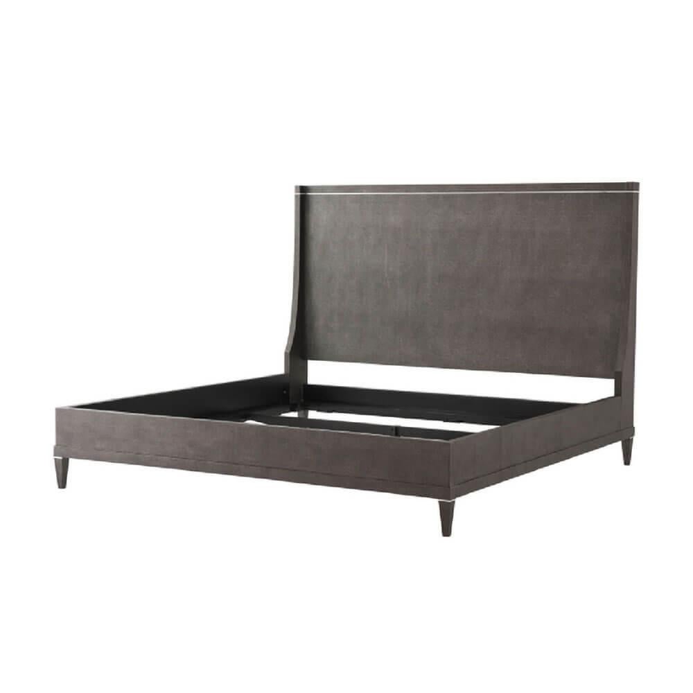 A classic modern shagreen embossed leather wrapped king size bed. The headboard with down swept wings, with polished nickel molding details, a stepped rail frame on square tapered legs.

Dimensions: 80.75