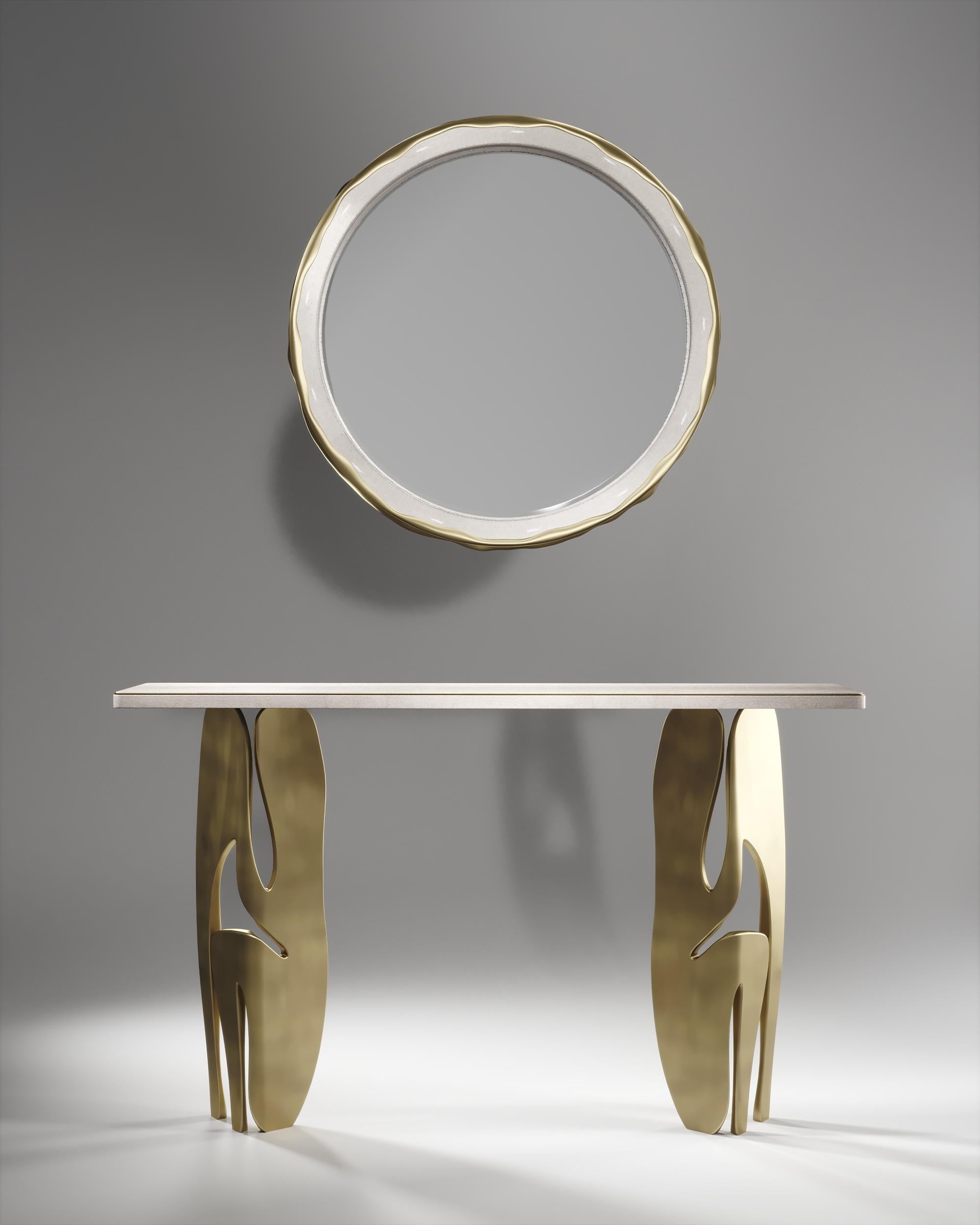 The Melting Mirror by R&Y Augousti in cream shagreen and bronze-patina brass, is an iconic piece of theirs with their signature 