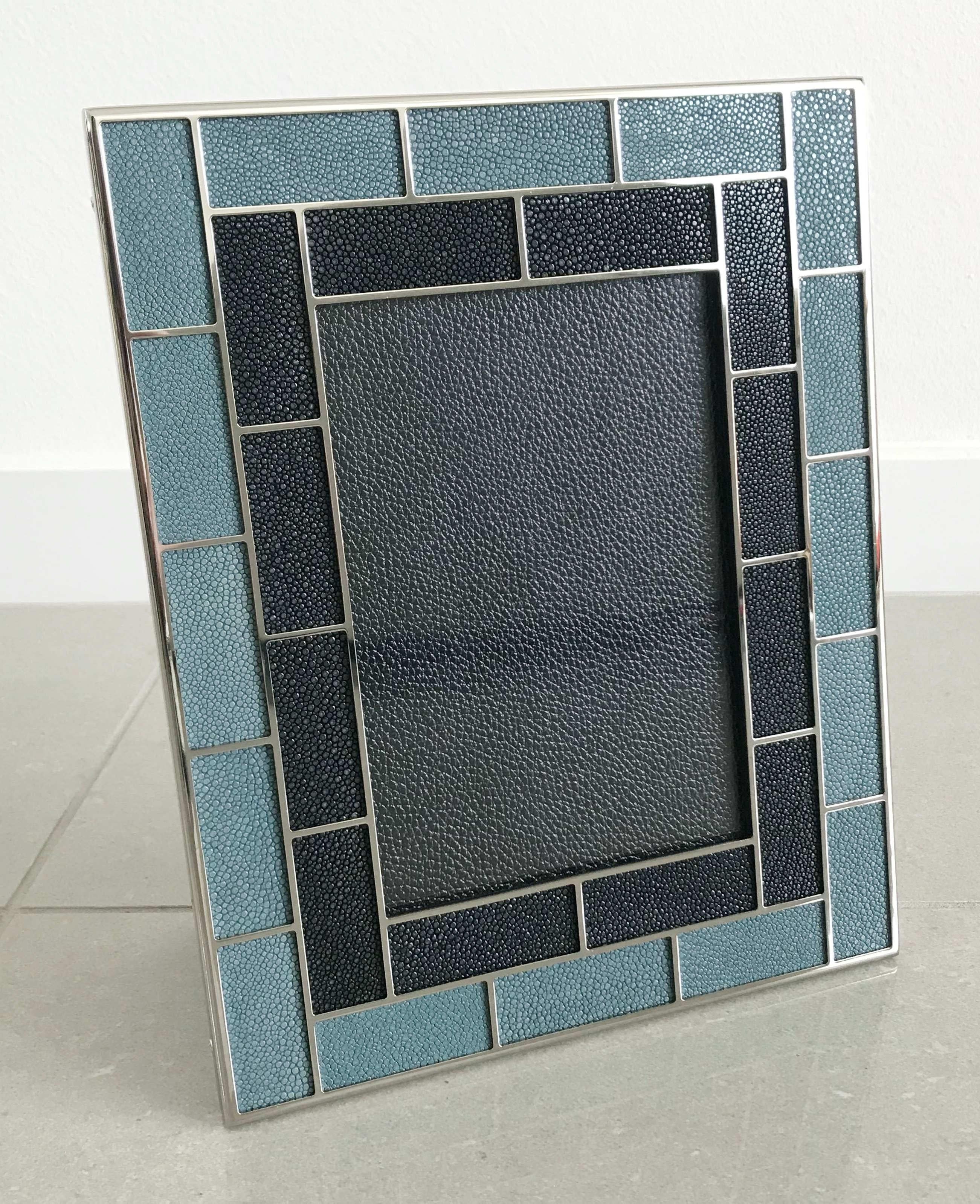 Black and blue shagreen leather and nickel-plated picture frame by Fabio Ltd
Measures: Height 10.5 inches / Width 8.5 inches / Depth 1 inch
Photo size: 5 inches by 7 inches
1 in stock in Palm Springs currently ON HOLIDAY SALE for $699 !!!
Order