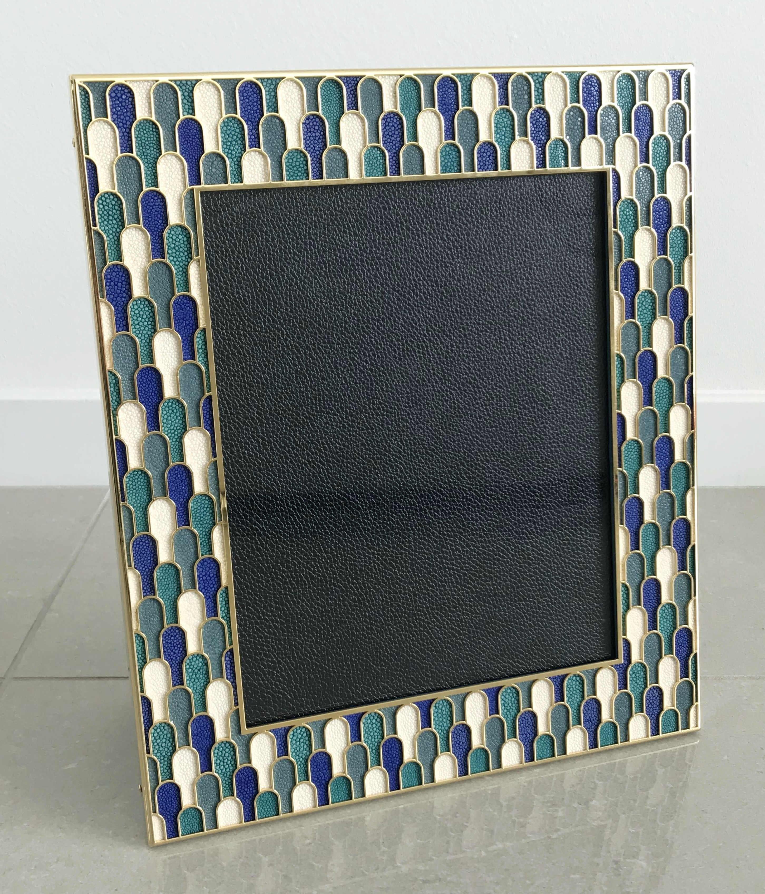 Multi-color shagreen leather and 24-karat gold-plated picture frame by Fabio Ltd
Measures: Height 13.5 inches, width 11.5 inches, depth 1 inch
Photo size: 8 inches by 10 inches
LAST 1 in stock in Palm Springs ON 50% OFF SALE for $749 !!!
Order