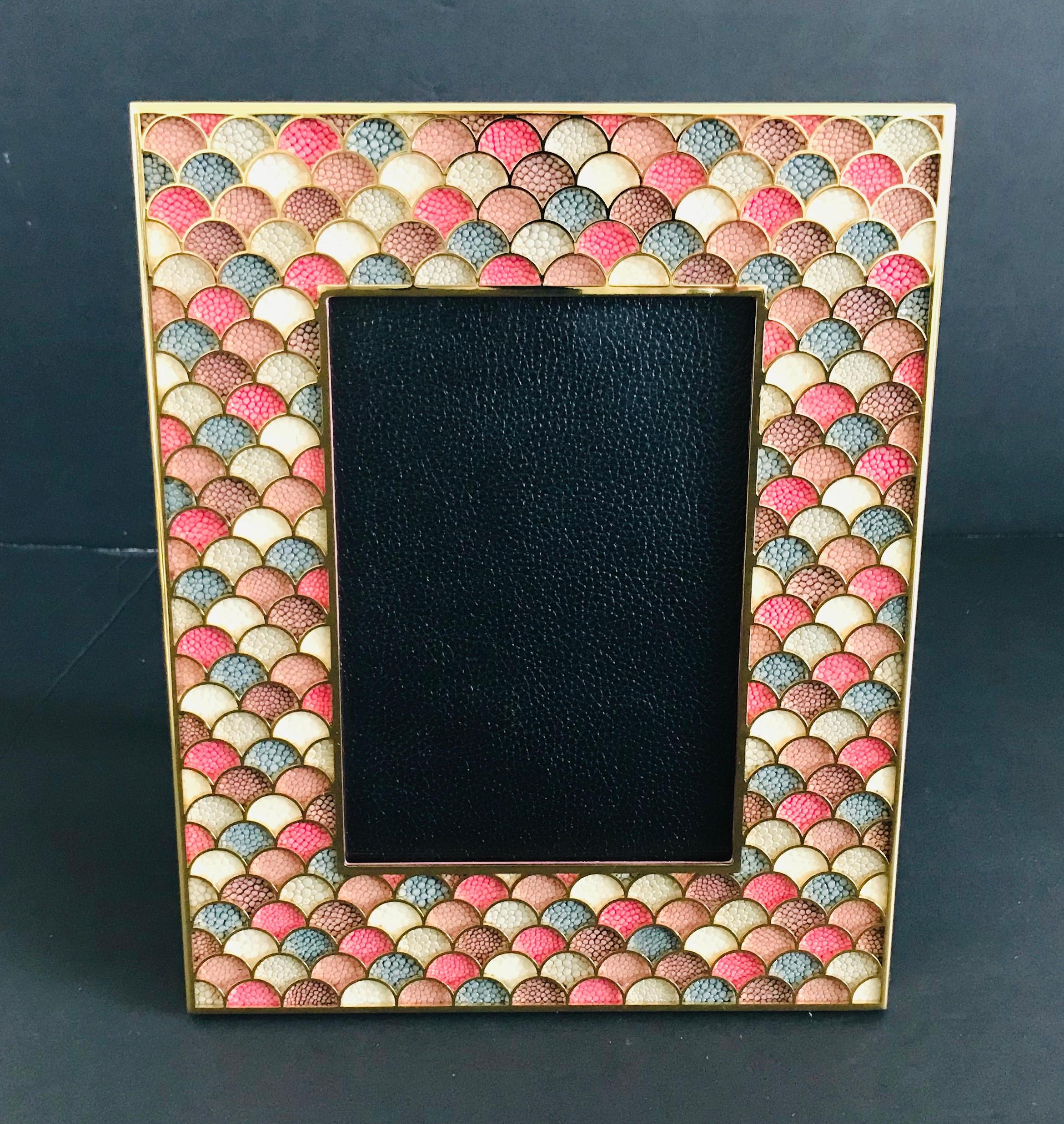 Multi-color shagreen leather and 24 karat gold-plated photo frame by Fabio Ltd
Height: 10.5 inches / Width: 8.5 inches / Depth: 1 inch
Photo size: 5 inches by 7 inches
LAST 1 in stock in Los Angeles
Order Reference #: FABIOLTD PF25
This piece makes