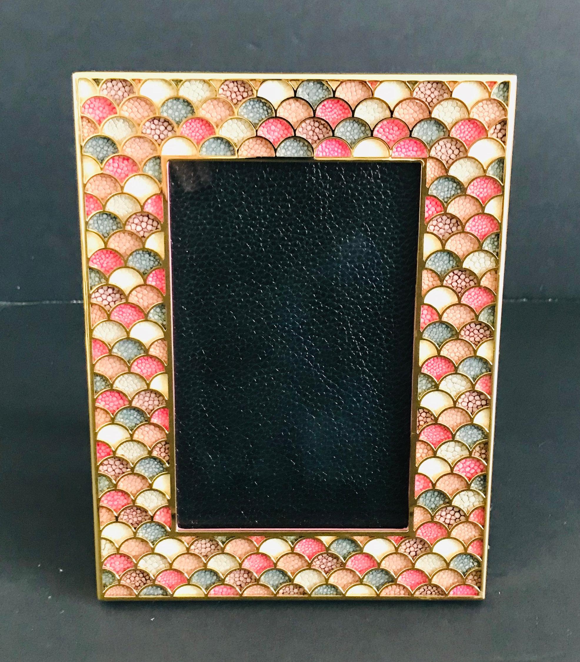 Multi-color shagreen leather and 24-karat gold-plated photo frame by Fabio Ltd
Height: 8 inches / Width: 6 inches / Depth: 1 inch
Photo size: 4 inches by 6 inches
LAST 1 in stock in Los Angeles
Order Reference #: FABIOLTD PF26
This piece makes for
