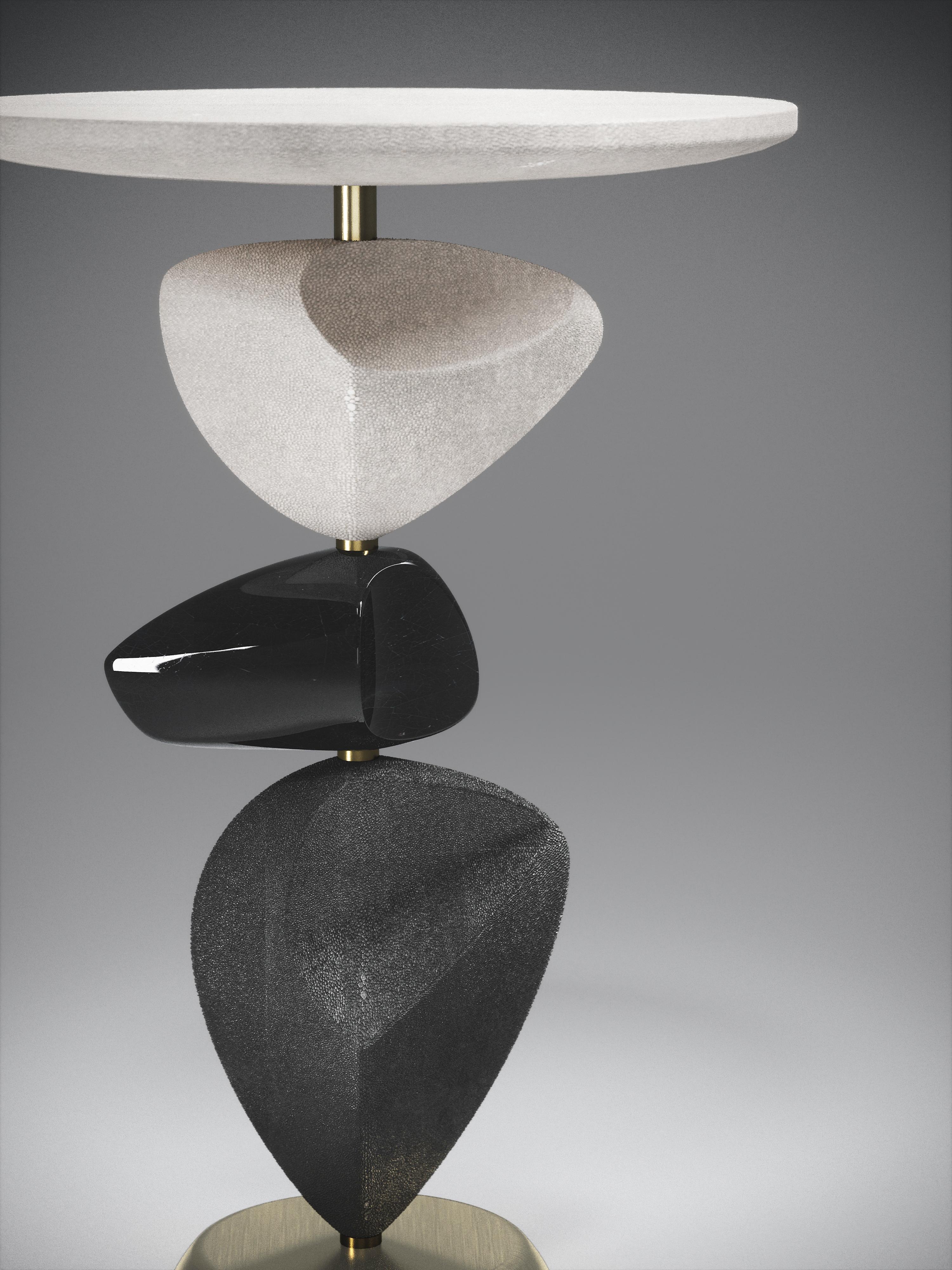 The Cosmo Moon side table by Kifu Paris is a whimsical and sculptural piece, inlaid in cream shagreen, black pen shell, coal black shagreen and bronze-patina brass. This piece is a sister to the original Cosmo Side Table by Kifu Paris, see images at