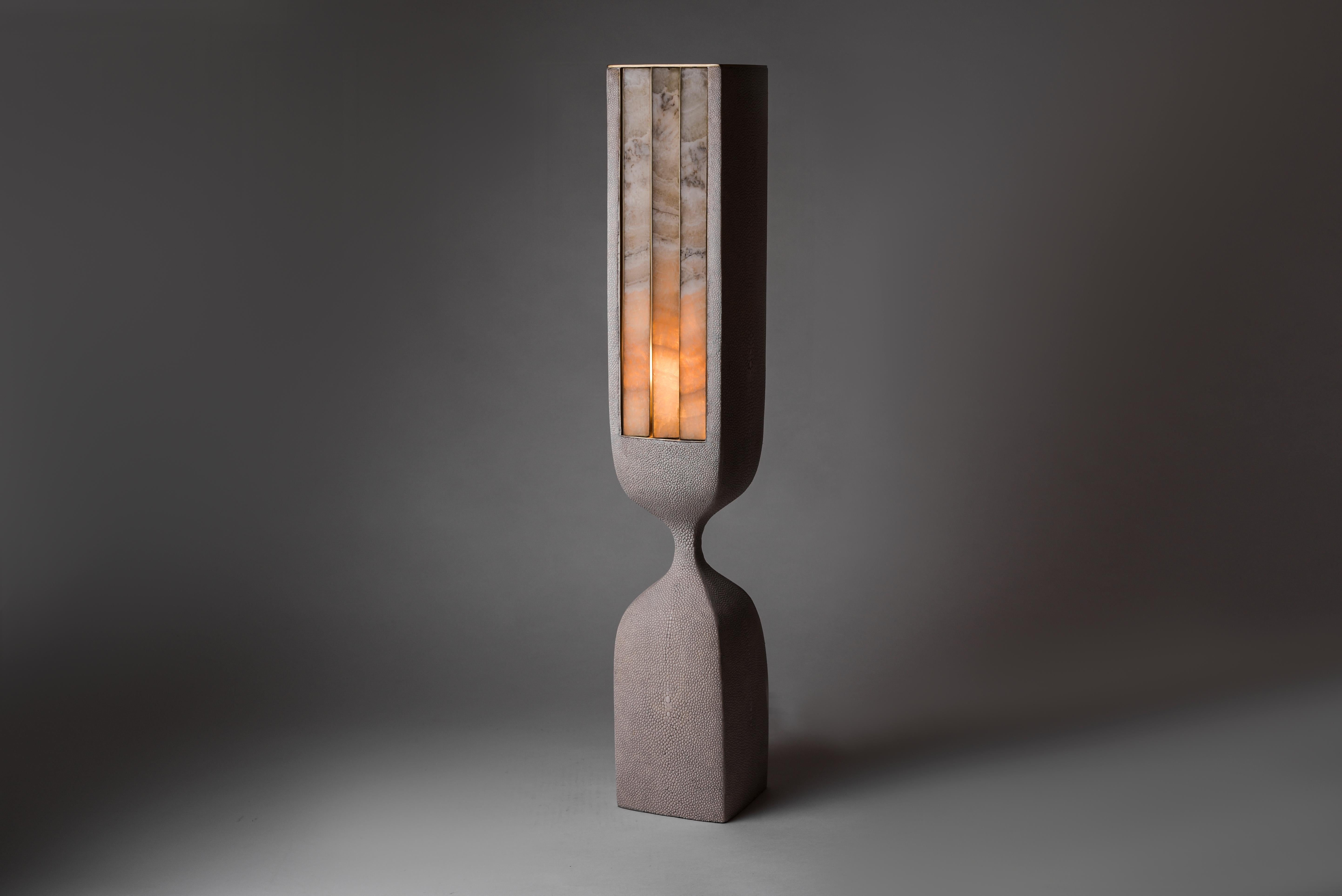 Patrick Coard Paris launches a unique and beautifully sculptural lighting collection inspired by music as a continuation of his candle line. The Rhapsody table lamp in cream shagreen is an ethereal and sculptural piece. The onyx and bronze patina