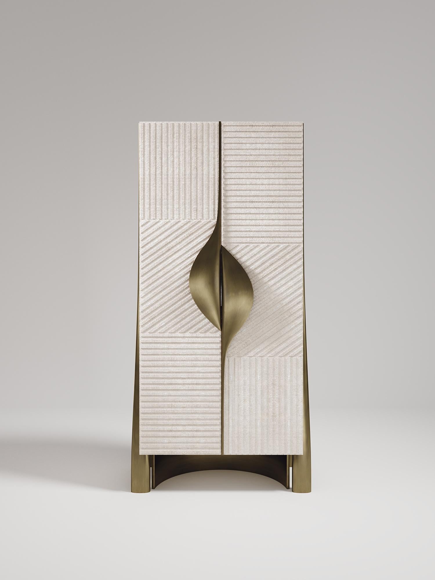 The Wave Vanity Cabinet by R&Y Augousti is one of a kind statement piece. The overall piece is inlaid in cream shagreen, with the exterior hand-carved in an updated version of the signature Augousti 