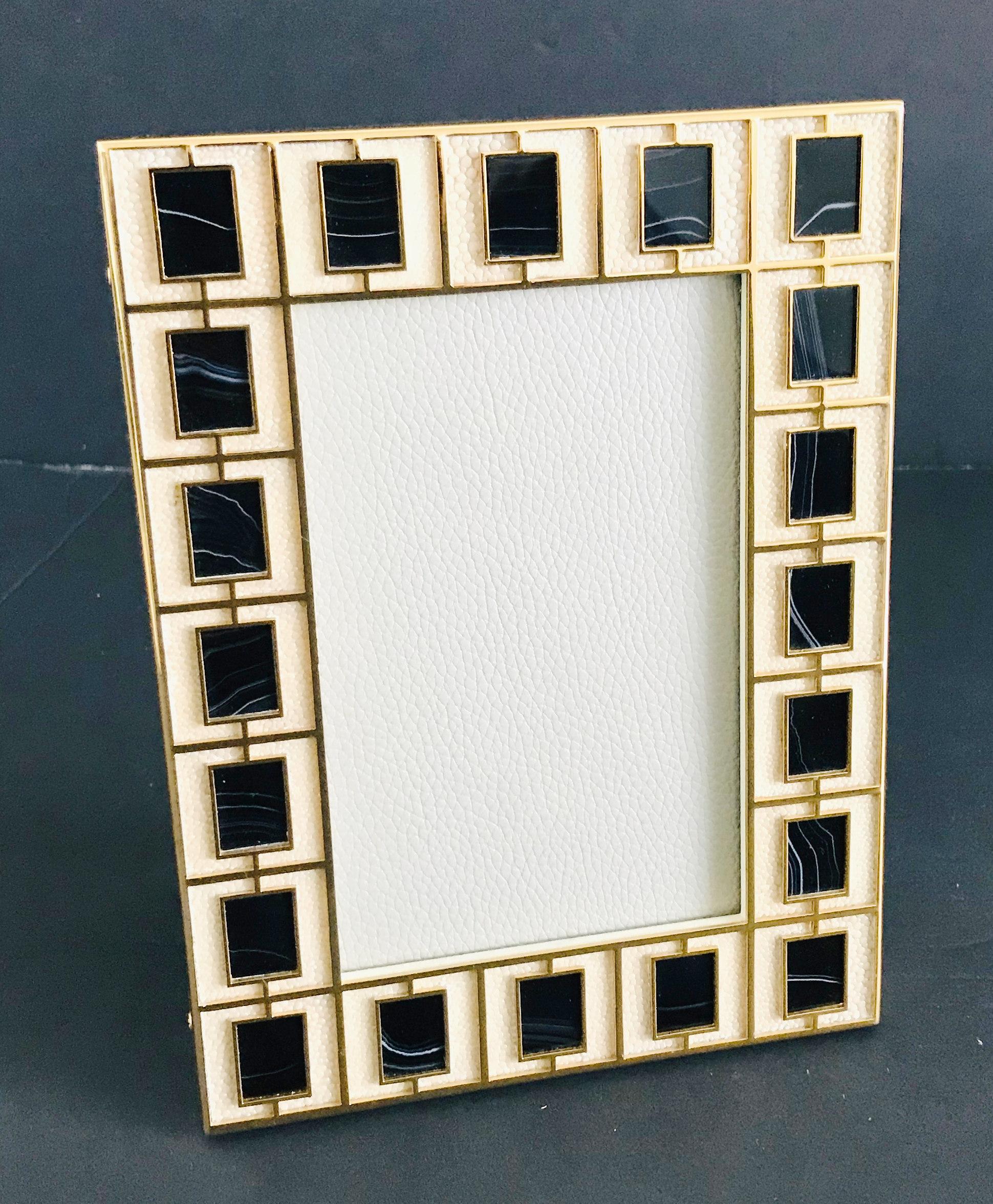 Ivory shagreen leather with black jade stones and gold-plated picture frame by Fabio Ltd
Height: 8 inches / Width: 6 inches / Depth: 1 inch
Photo size: 4 inches by 6 inches
1 in stock in Palm Springs currently ON 30% OFF SALE for $875 !!!
Order