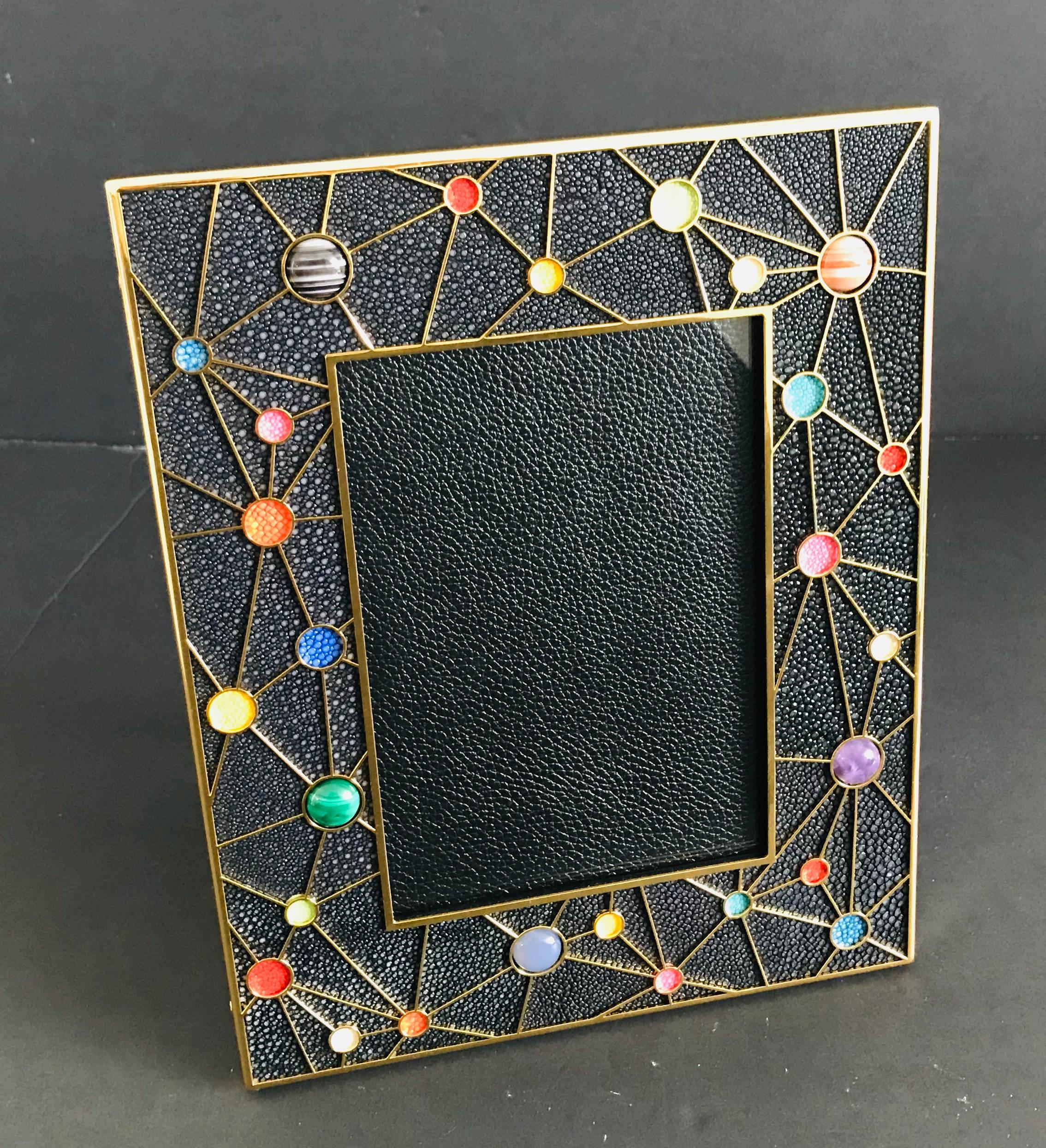 Black shagreen with multi-color stones and gold-plated picture frame by Fabio Ltd
Height: 10.5 inches / Width: 8.5 inches / Depth: 1 inch
Photo size: 5 inches by 7 inches
1 in stock in Palm Springs
Order Reference #: FABIOLTD PF42
This piece makes