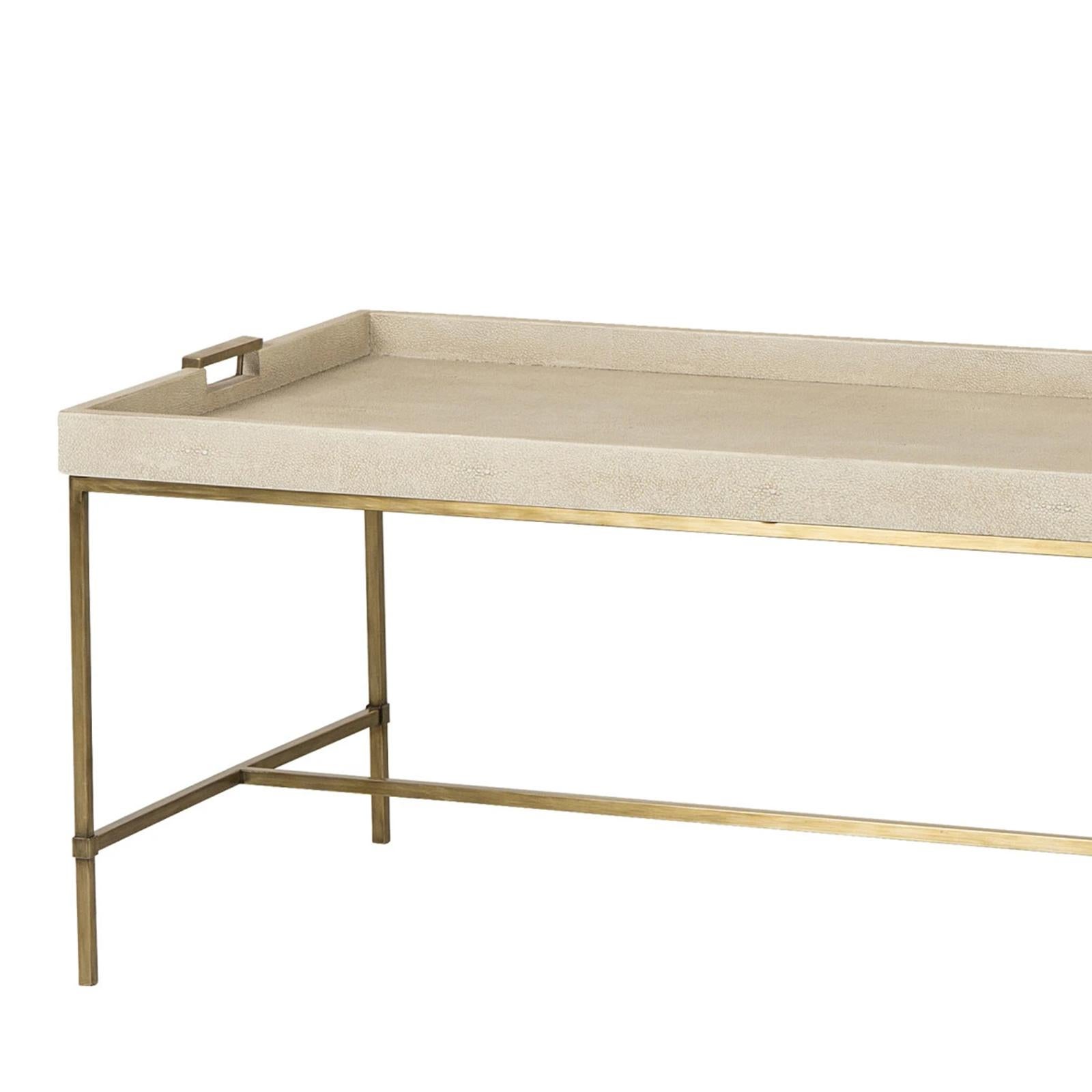 Coffee table Shagry cream with base in stainless steel
 in brass finish. With top in poplar wood covered with 
cream shagreen.