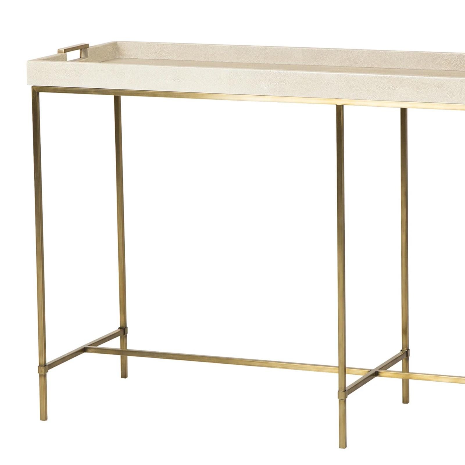 Console table shagry cream with base in stainless steel
 in brass finish. With top in poplar wood covered with 
cream shagreen.
