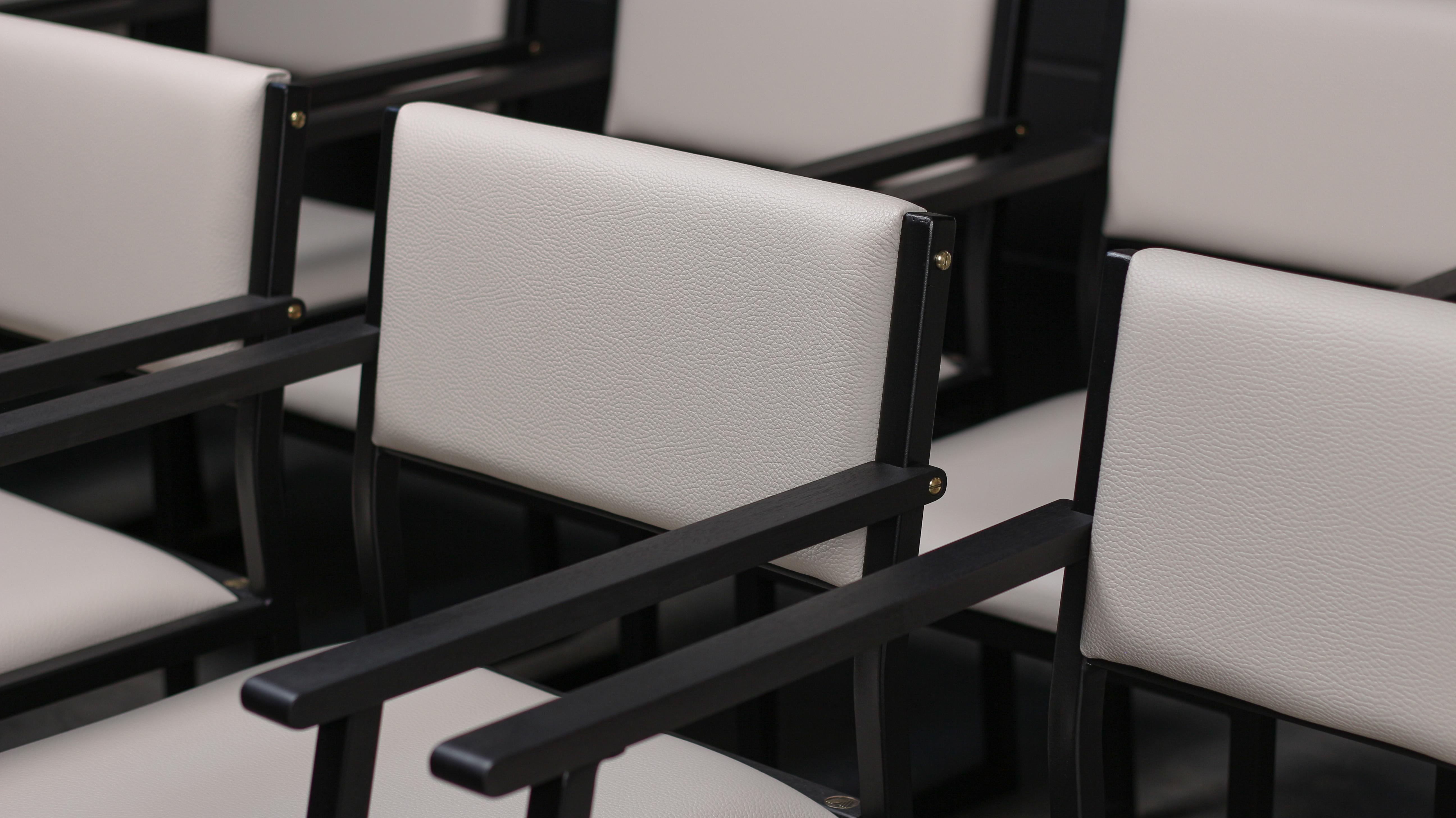 The Shaker modern Armchair is handmade to order from our unique Ambrozia black textured steel frame. Featuring solid wood arms & seat trim that will give a warm and distinguished touch to your space. Shown here in : Illusion Greige Leather, Ebonized