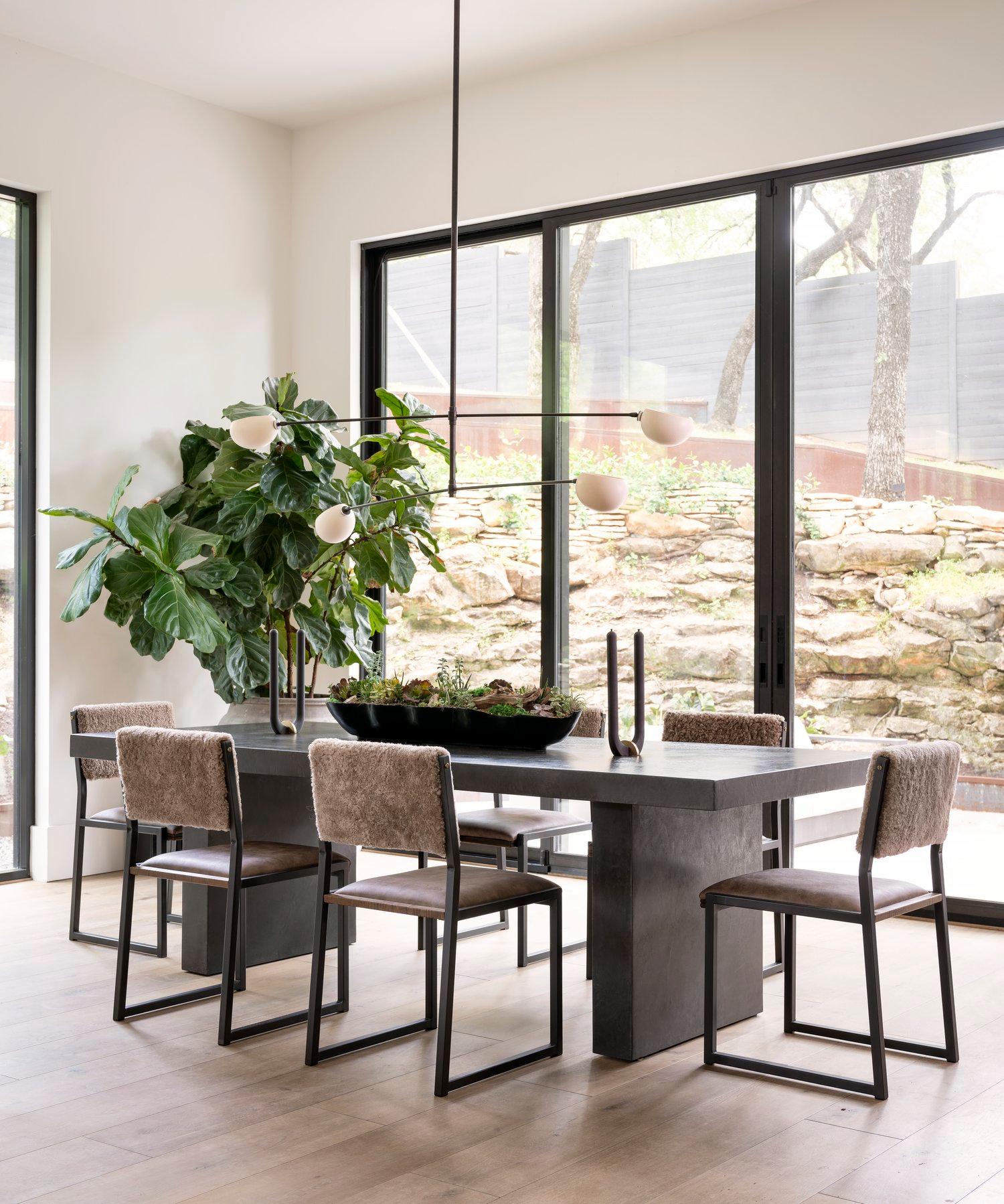 The Shaker chair is handcrafted to order from refined blackened Steel metal frame with a leather seat and Shearling back. Featuring subtile solid wood insertion that will give a warm and distinguished touch to your space. This contemporary/modern