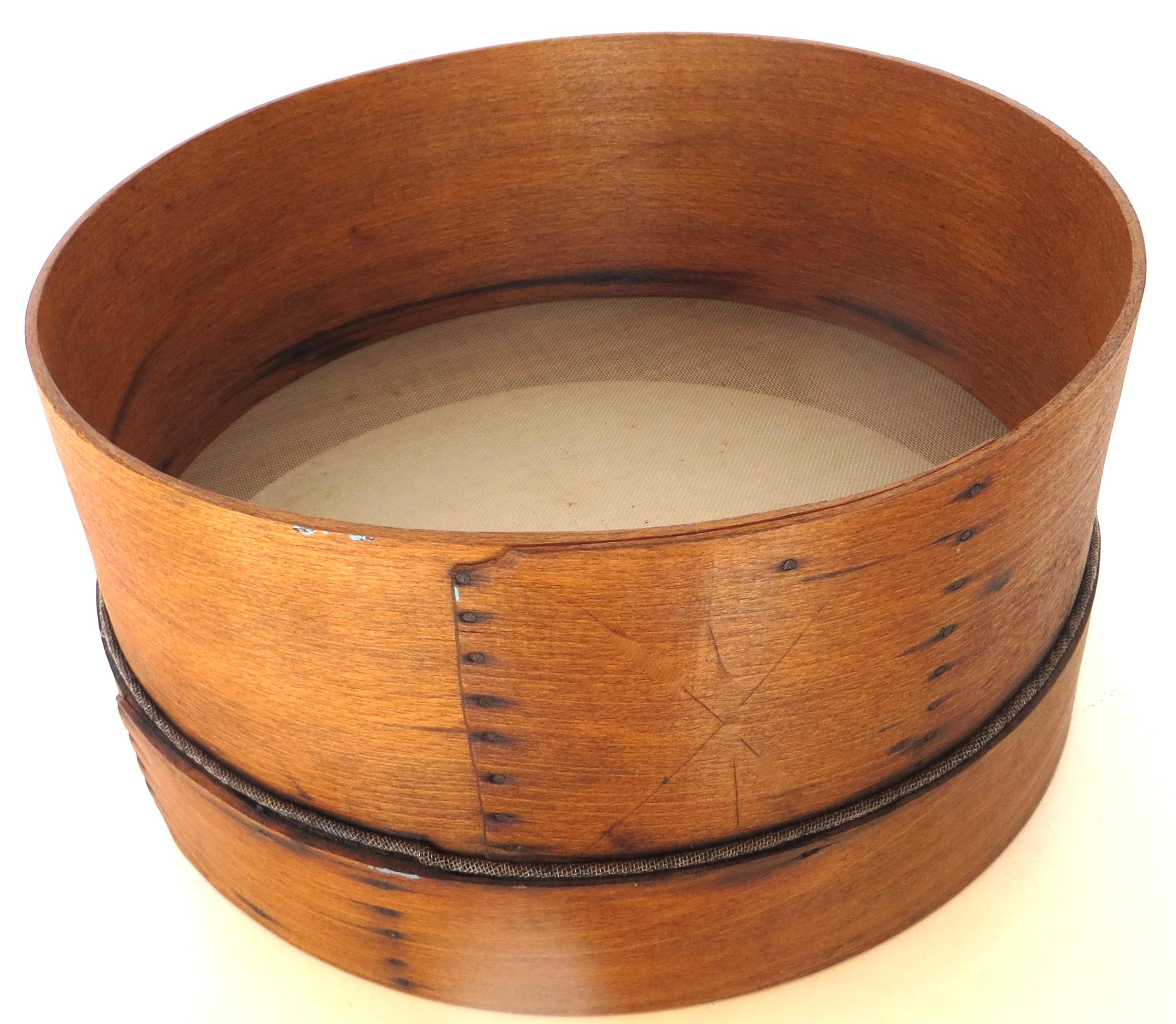 Wonderful all original condition, circular Pennsylvania Shaker flour sifter, with wire inserted screen;  circa 1900.  There is evidence of rusted original pin nails which join the bentwood frame at the overlaps *see images”. There is a 2