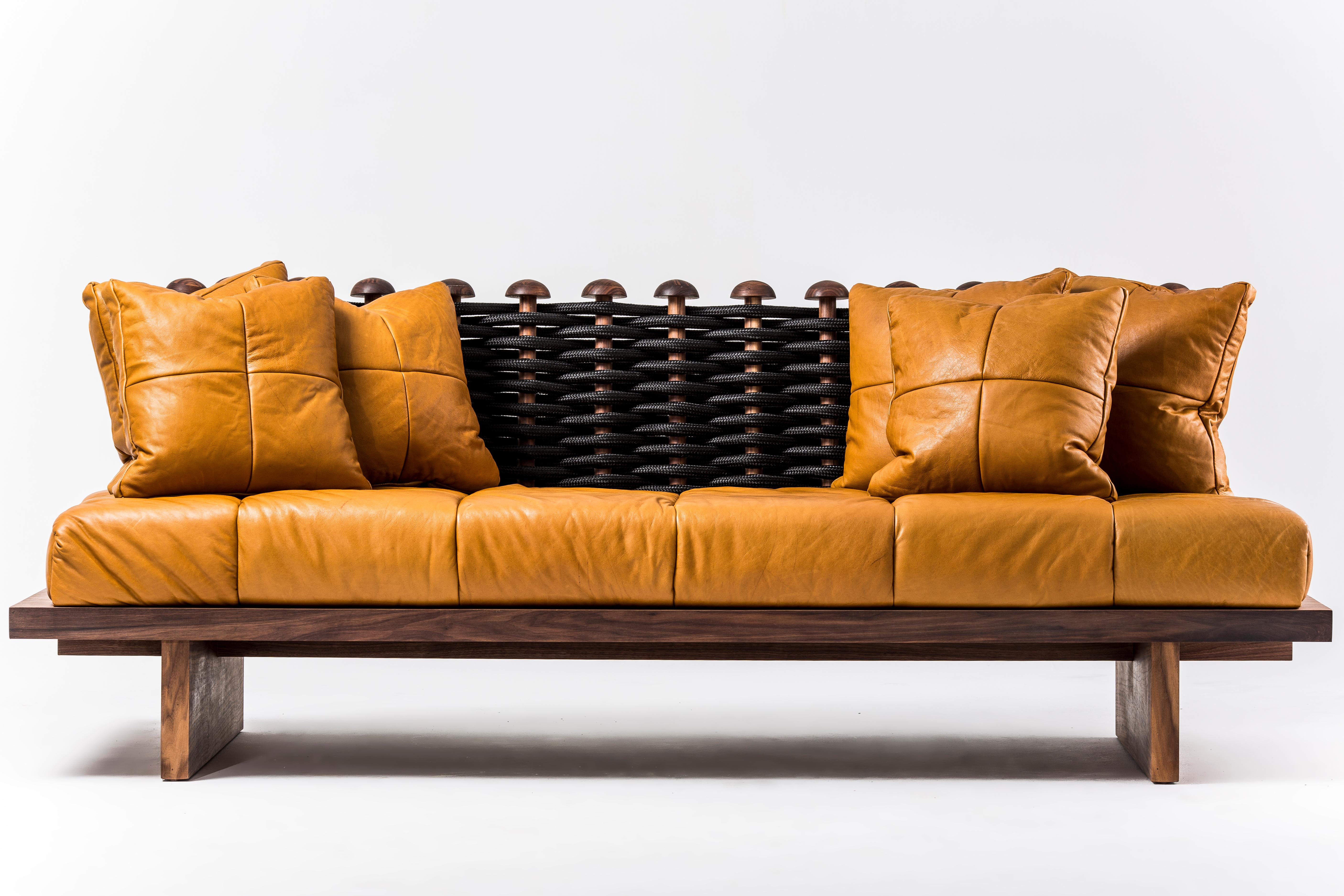 Shaker sofa by Egg Designs
Dimensions: 110 L X 240 D X 92.3 H cm
Materials: walnut timbe, nylon rope, leather upholstry

Founded by South Africans and life partners, Greg and Roche Dry - Egg is a unique perspective in contemporary furniture inspired