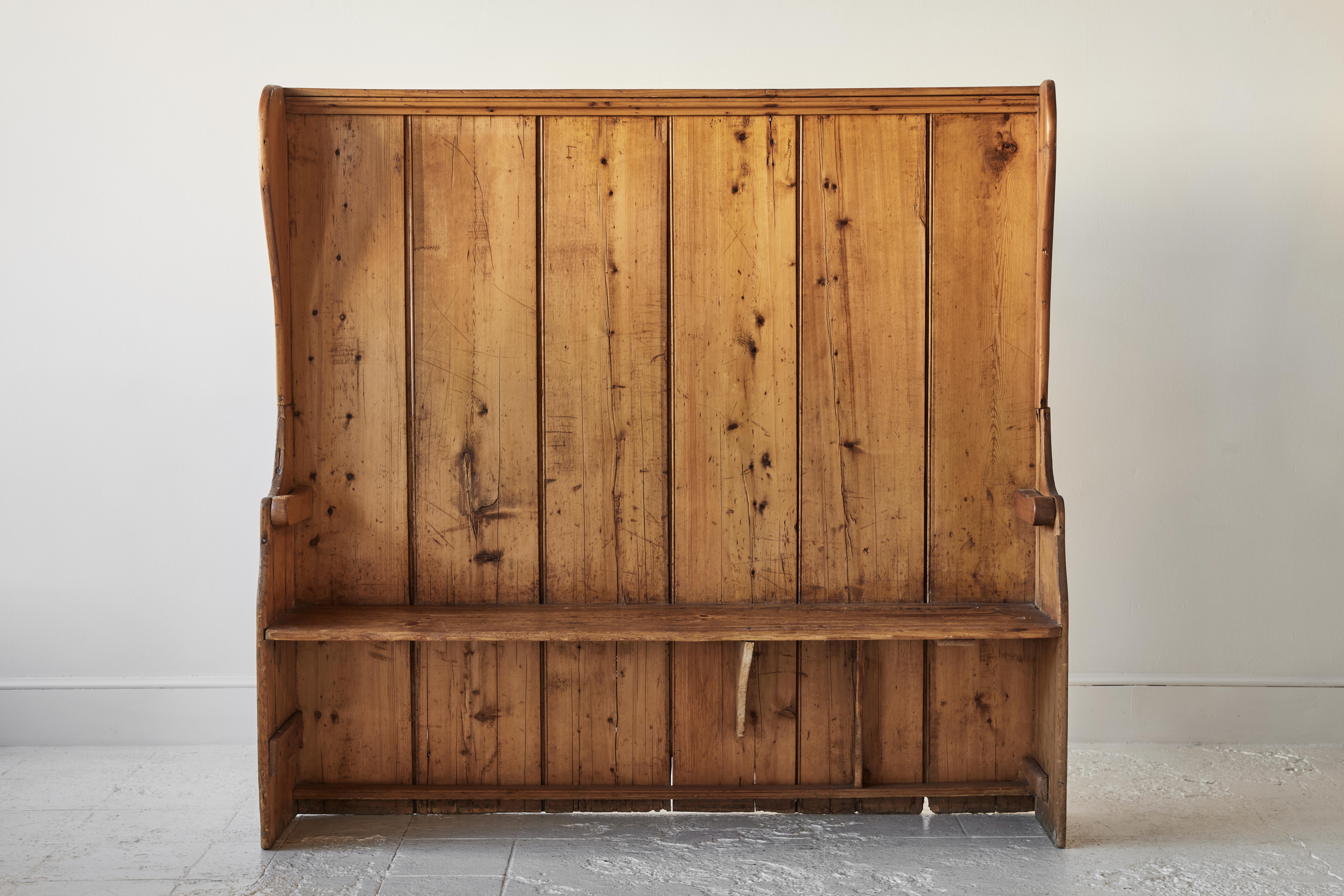 Shaker style high back bench pew.