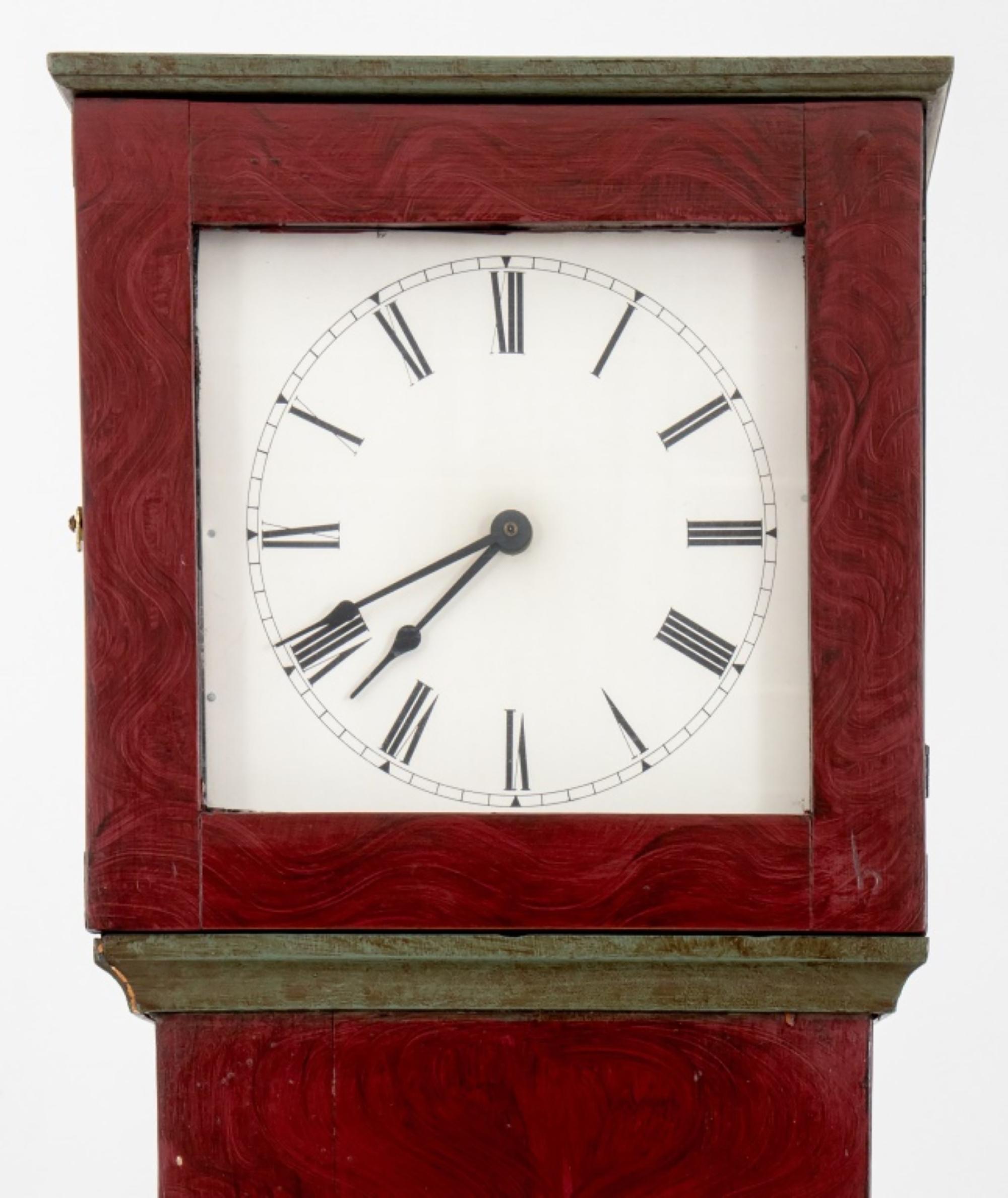 Shaker-Style Tall Case Grandfather Clock from the 20th century, painted red and black. Here are the details:

Style: Shaker-Style
Type: Tall Case Grandfather Clock
Period: 20th century
Finish: Red and Black paint
Provenance: From the 50 East 89th