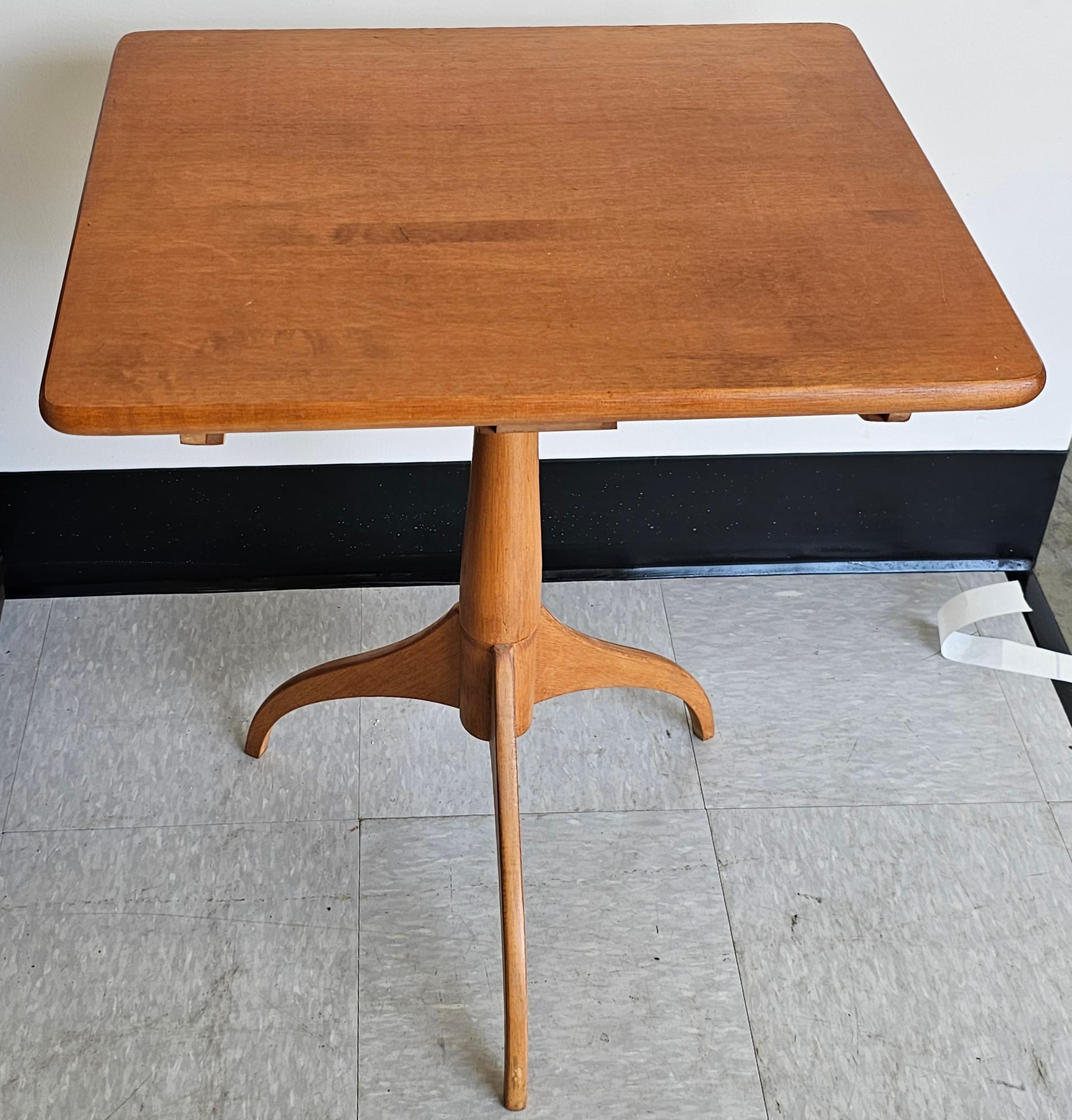 A Shakers Worshops Pedestal Spider Legs Maple Candle Stand. Clean vintage condition. Measures 21