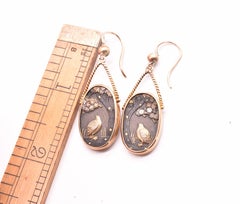 Shakudo Bird Gazing at Tree Earrings