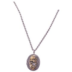 Antique Shakudo Locket and Integrated Chain with Two Enchanting Scenes, circa 1900