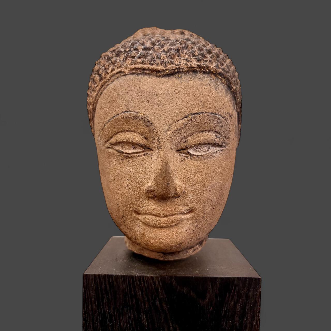 Hand-Carved Shakyamuni Buddha head in sandstone, Thailand, Ayutthaya, 17th century For Sale
